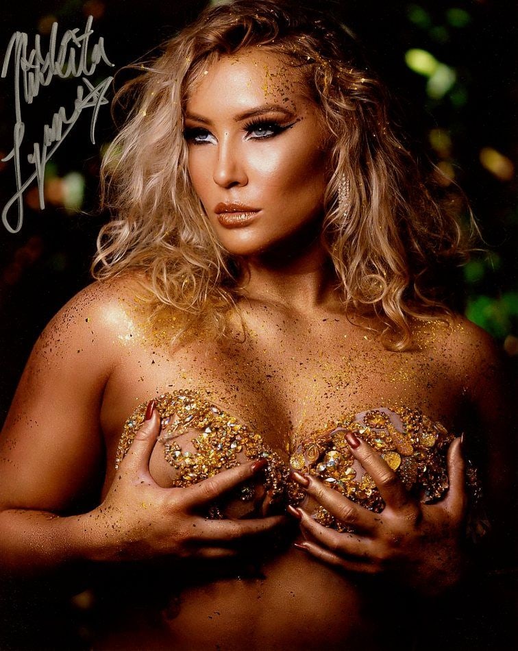 Nikkita Lyons WWE In Person Signed Photo: Photo size is 8x10. PRIVATE SIGNING. Nikkita Lyons / Faith Jefferies is an American professional wrestler, taekwondo practitioner, and musician. She is currently signed to WWE, where she performs on i