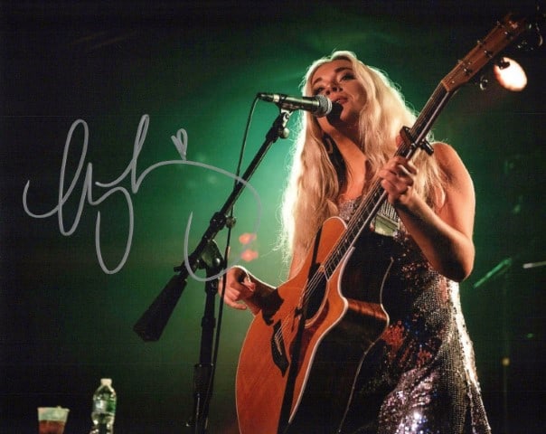 Megan Morony COUNTRY SINGER In Person Signed Photo: Photo size is 8x10. Megan Morony in person signed photo. Megan Moroney is an American country music singer and songwriter from Douglasville, Georgia. She charted her second single, "Tennessee Orange",