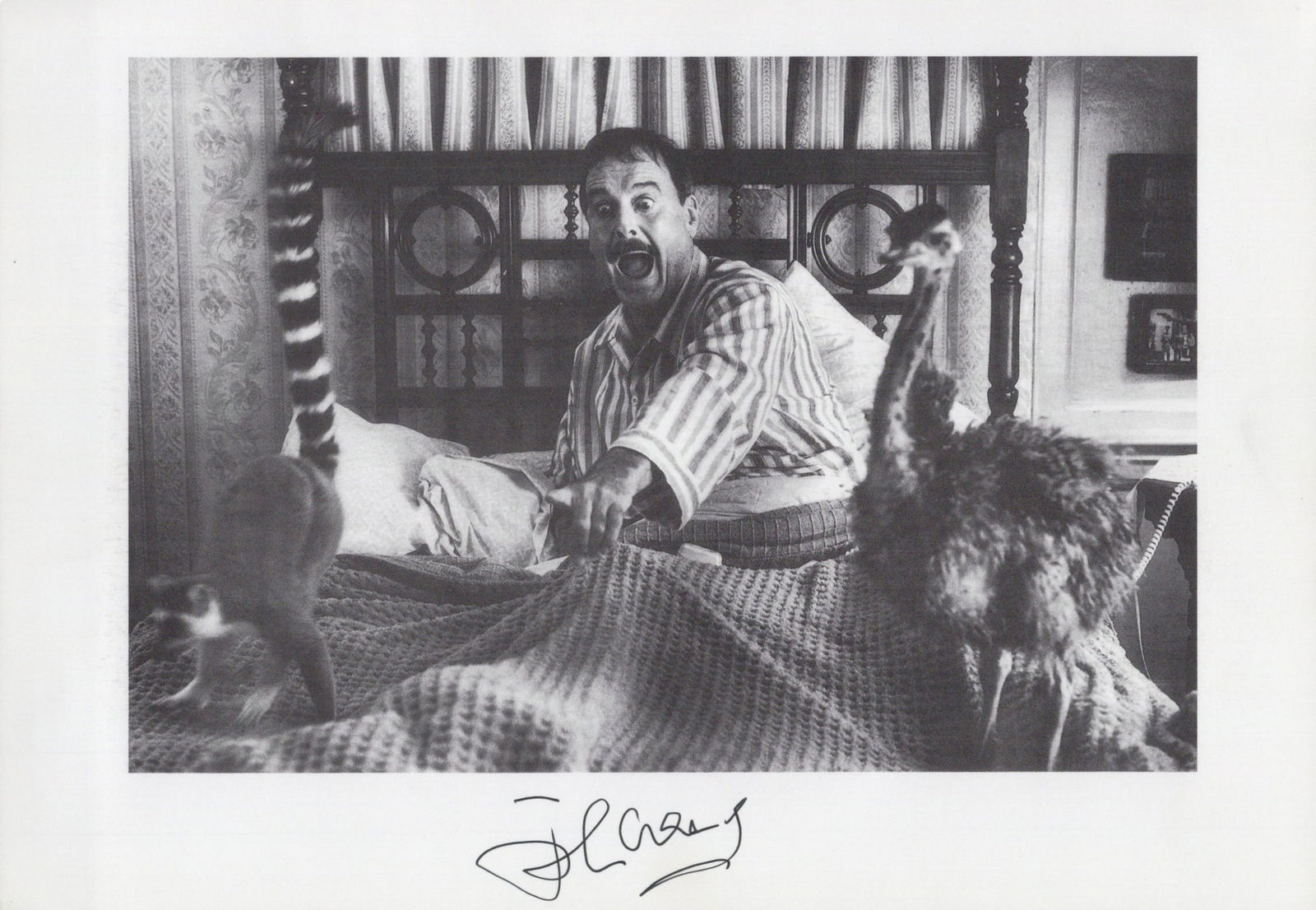 John Cleese FIERCE CREATURES In Person Signed Photo: Photo size is 8x6. John Cleese in person signed photo from the movie FIERCE CREATURES. John Cleese as the character Rollo Lee.