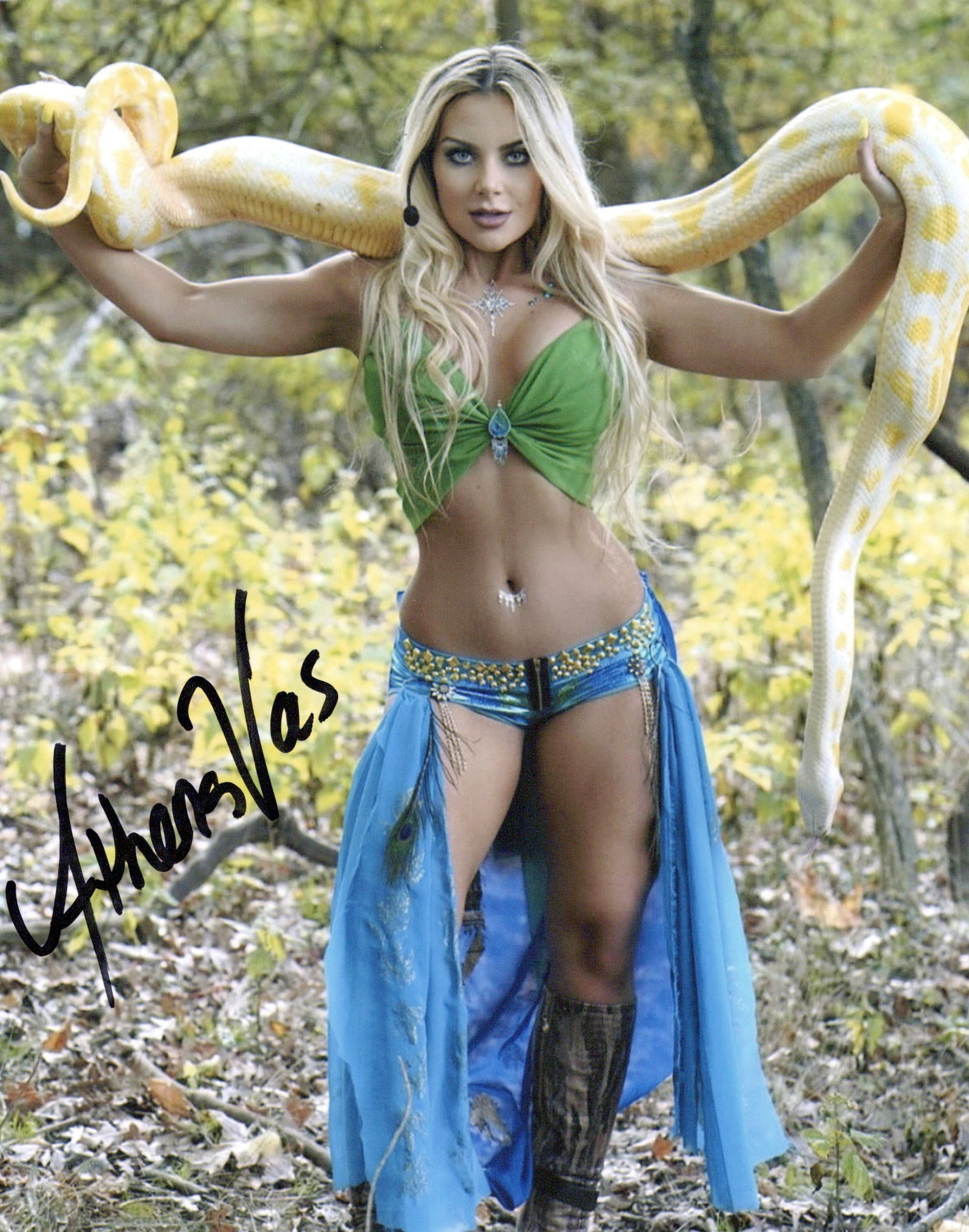 Athena Vas CINDERELLA'S BALL / MACABRE MANSION In Person Signed Photo: Photo size is 8x10. Athena Vas in person signed photo. Athena Vas is a model, actress and director. Known for CINDERELLA'S BALL, MAIL ORDER BRIDE, and MACREBA MANSION NYC.