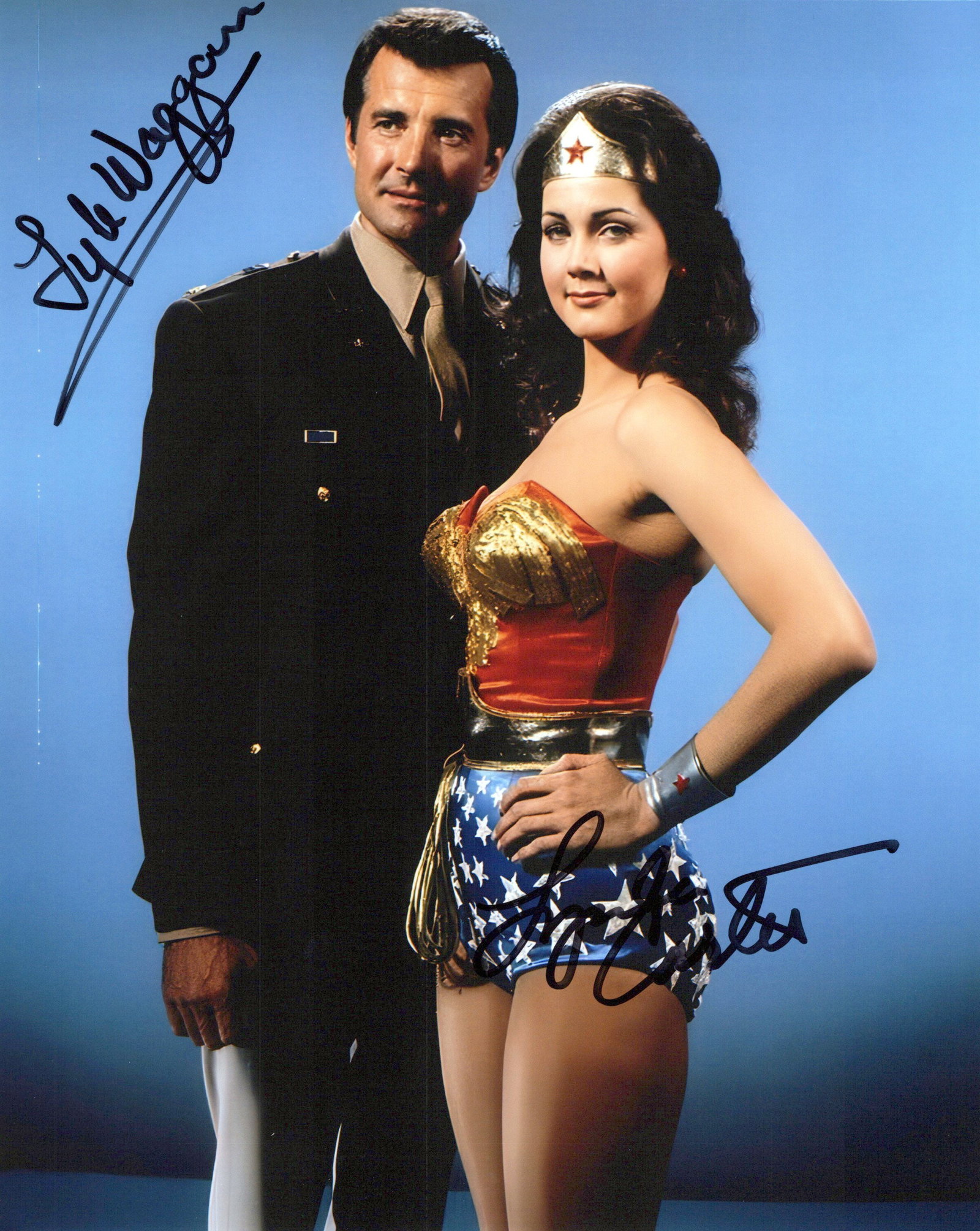 Lynda Carter / Lyle Waggoner WONDER WOMAN In Person Signed Photo: Photo size is 8x10. Lynda Carter / Lyle Waggoner in person signed photo from the TV series WONDER WOMAN. Lynda Cater as the character Diana Prince / Wonder Woman. Lyle Waggoner as the character Col. S