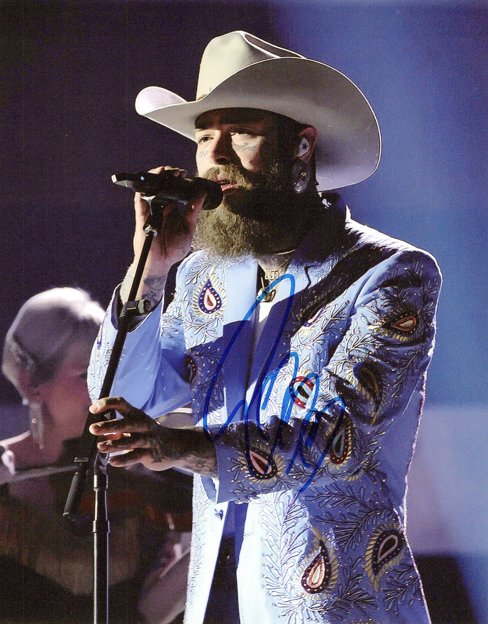 Post Malone MUSICIAN In Person Signeded Photo: Photo size is 8x10. Post Malone in person signed autographed photo. Austin Richard Post, known professionally as Post Malone, is an American rapper, singer, songwriter, and record producer. Known for