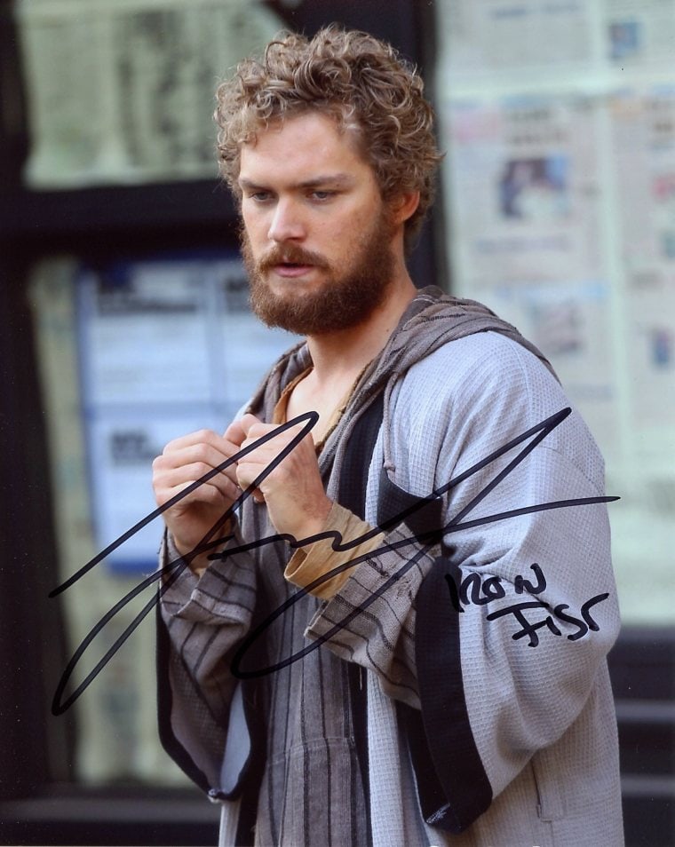 Finn Jones IRON FIST In Person Signed Photo: Photo size is 8x10. Finn Jones in person signed autographed photo from the TV series IRON FIST. Finn Jones as the character Danny Rand