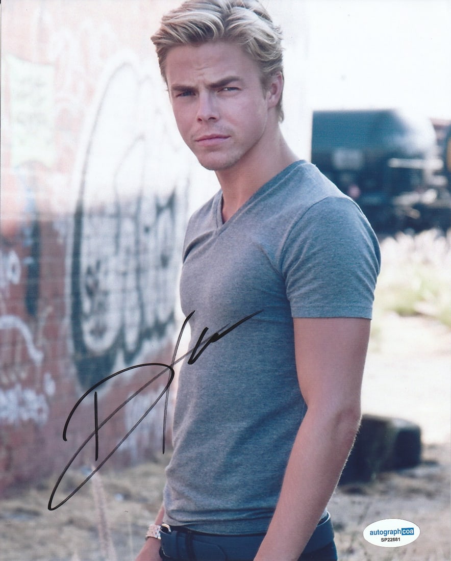 Derek Hough DWTS / NASHVILLE In Person Signed Photo: Photo size is 8x10. Derek Hough in person signed photo. Derk Hough is a multi-talented entertainer, Emmy-winning choreographer, and New York Times best-selling author. He's perhaps best known for his