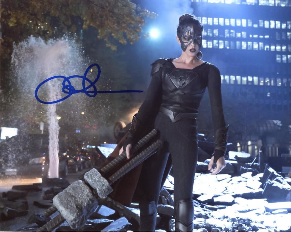 Odette Yustman SUPERGIRL In Person Signed Photo: Photo size is 8x10. Odette Yustman in person signed autographed photo from the TV series SUPERGIRL. Odette Yustman as the character Samantha Aries / Reign