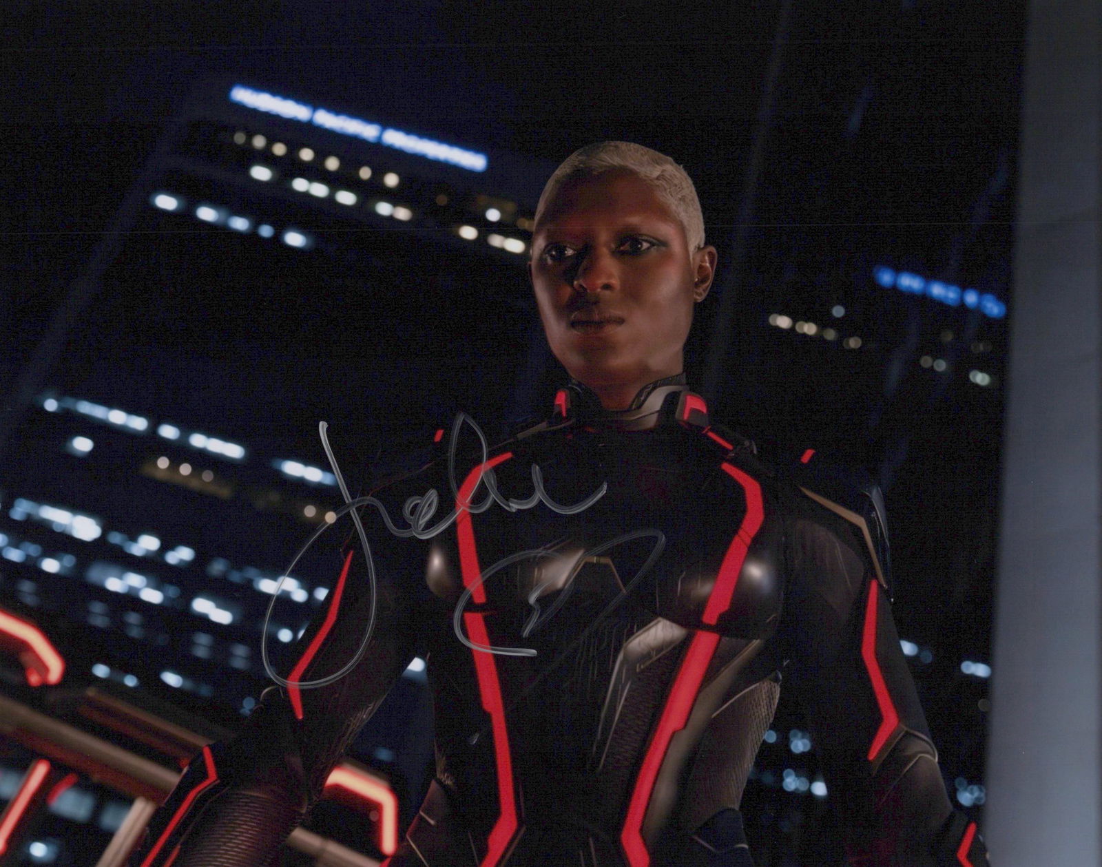 Jodie Turner-Smith TRON ARES In Person Signed Photo: Photo size is 8x10. Jodie Turner-Smith in person signed photo from the movie TRON: LEGACY. Jodie Turner-Smith As the character Athena.