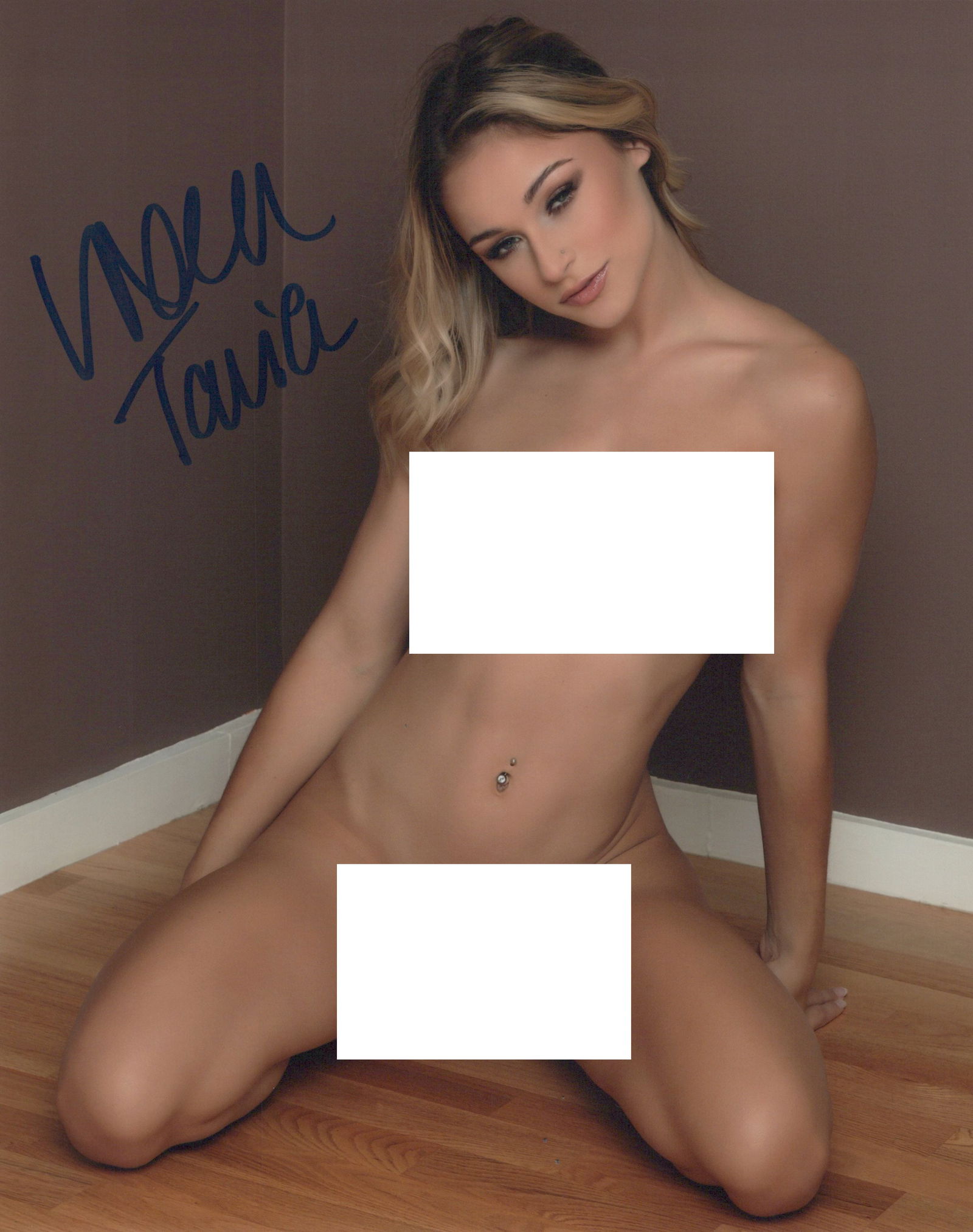 Vixen Tavia SIGNATURE MODEL In Person Signed Photo: Photo size is 8x10. PRIVATE SIGNING. Vixen Tavia in person signed photo. Signature Model. This item was signed at an exclusive signing and photo shoot.