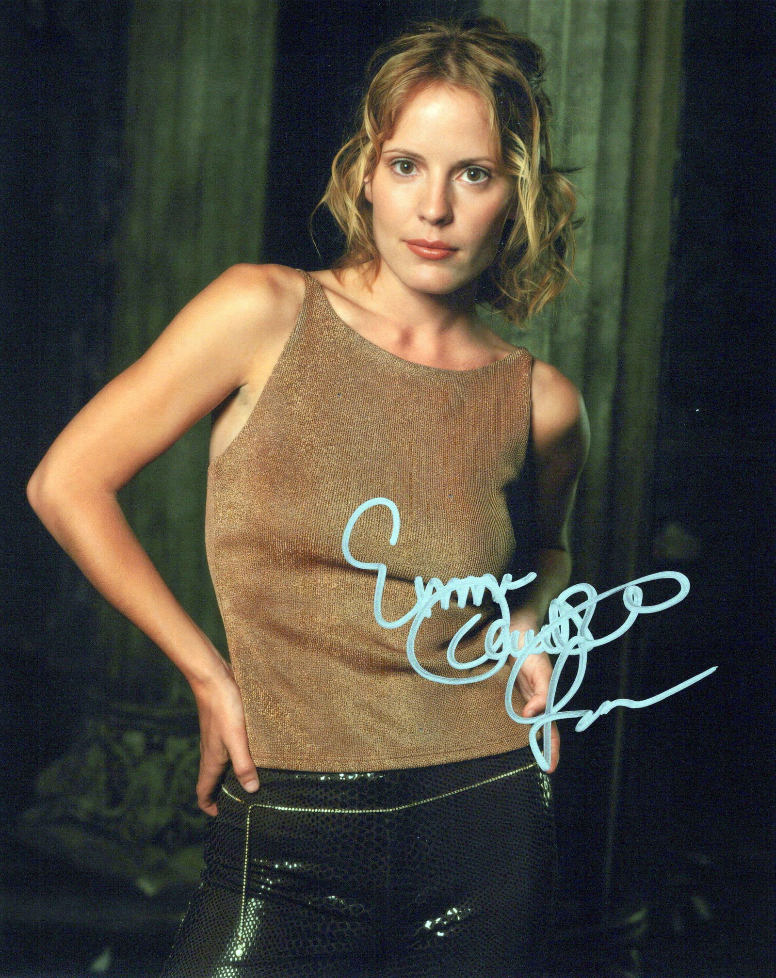Emma Caulfield BUFFY In Person Signed Photo: Photo size is 8x10. PRIVATE SIGNING. Emma Caulfield in person signed photo from the TV series BUFFY THE VAMPIRE SLAYER. Emma Caulfield as the character Anya.