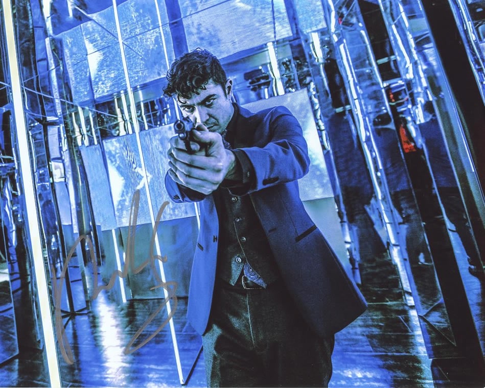 Riccardo Scamarcio JOHN WAYNE In Person Signed Photo: Photo size is 8x10. Riccardo Scamarcio in person signed autographed photo from the movie JOHN WICK CHAPTER 2. Riccardo Scamarcio as the character Santino D'Antonio