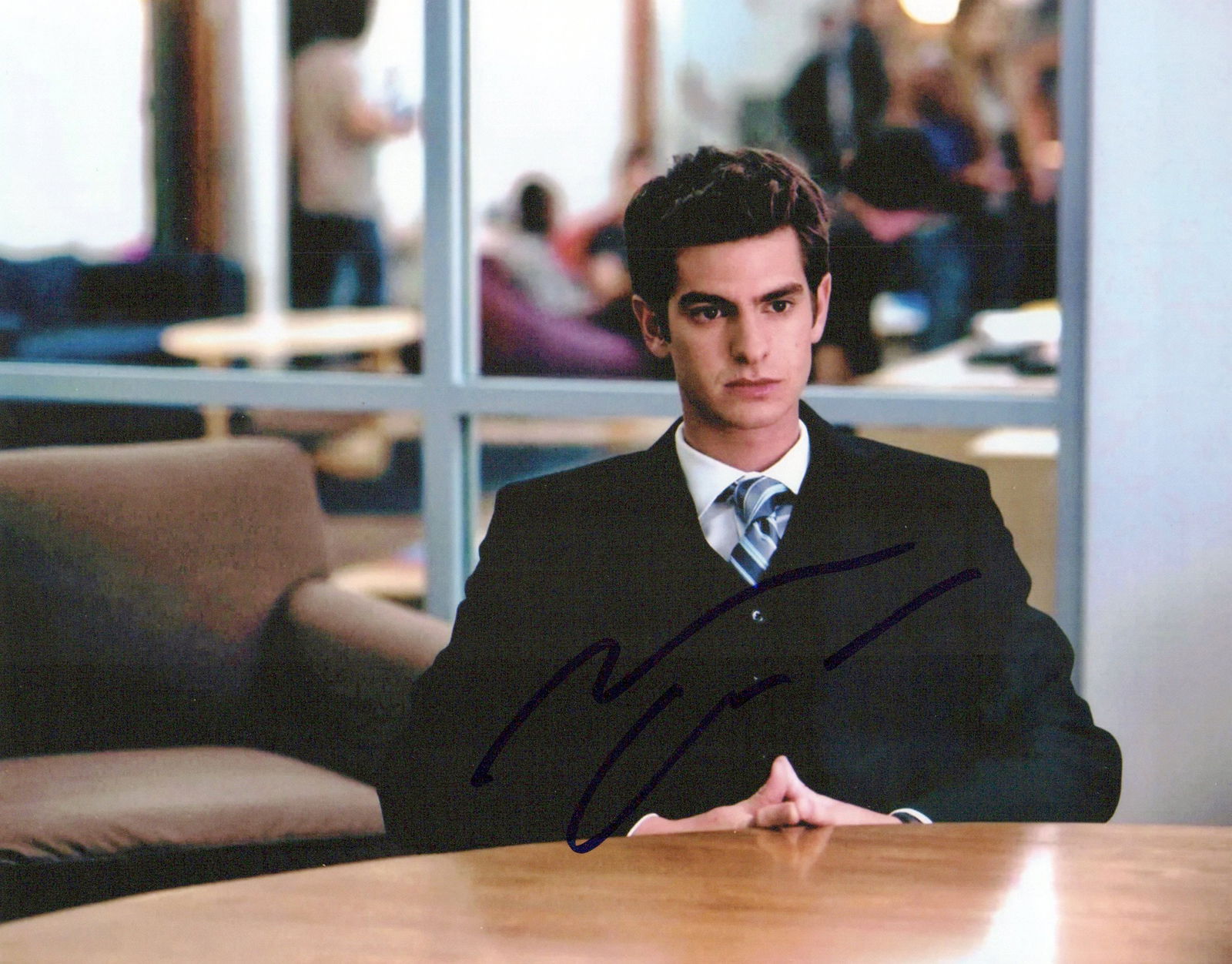 Andrew Garfield THE SOCIAL NETWORK In Person Signed Photo: Photo size is 8x10. Andrew Garfield in person signed photo from the movie THE SOCIAL NETWORK. Andrew Garfield as the character Eduardo Saverin