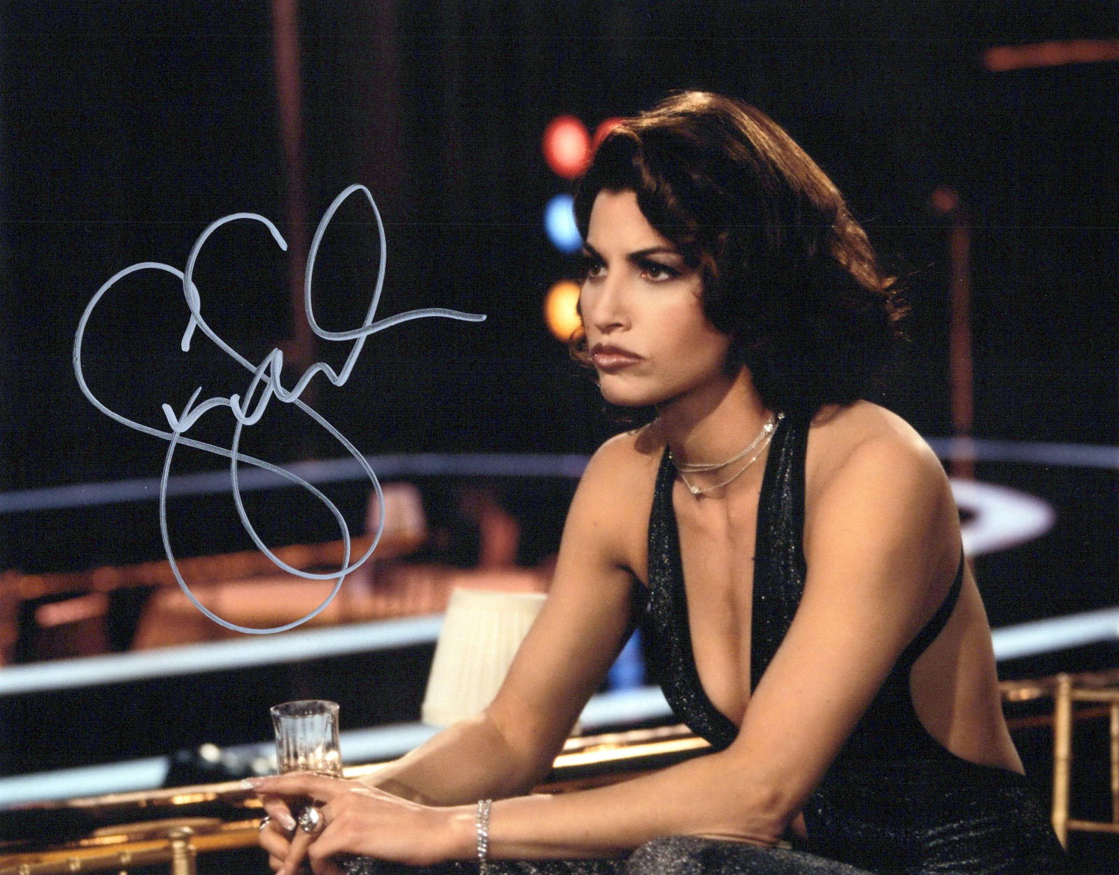 Gina Gershon SHOWGIRLS In Person Signed Photo: Photo size is 8x10. (signed at RICC) Gina Gershon in person signed photo from the movie SHOWGIRLS. Gina Gerson as the character Cristal Connors.