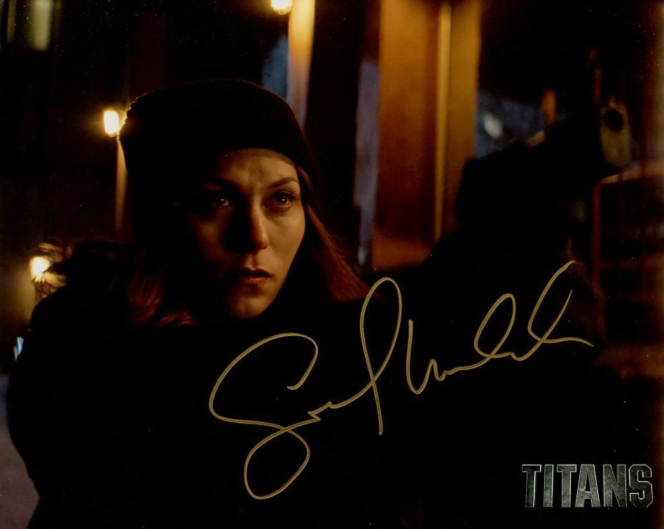 Savanah Welch TITANS In Person Signed Photo: Photo size is 8x10. Savanna Welch in person signed photo from the TV series TITANS. Savanna Welch as the character Barbara Gordon.