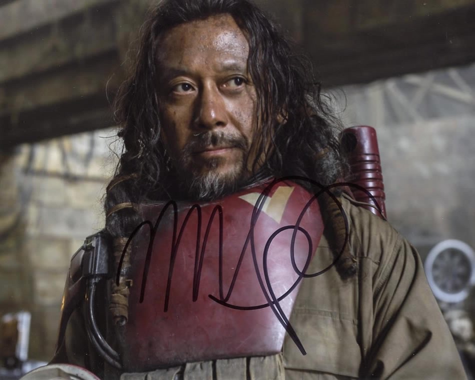 Jiang Wen STAR WARS ROGUE ONE In Person Signed Photo: Photo size is 8x10. Jiang Wen in person signed autographed photo from the movie STAR WARS ROGUE ONE. Jiang Wen as the character Baze Malbus