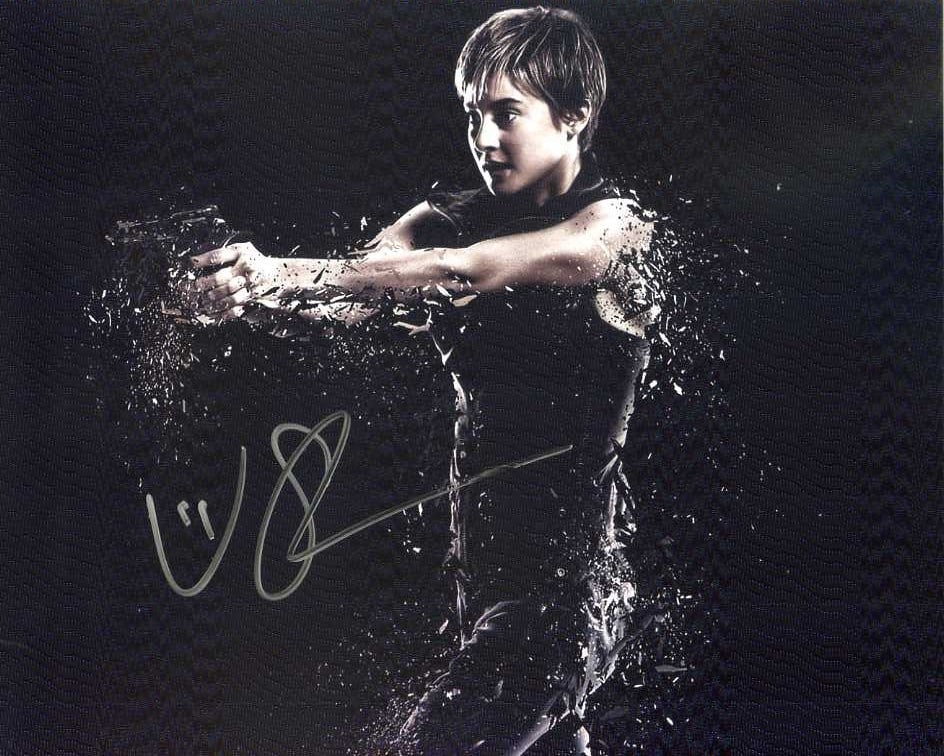 Shailene Woodley INSURGENT In Person Signed Photo: Photo size is 8x10. Shailene Woodley in person signed autographed photo from the movie INSURGENT. Shailene Woodley as the character Tris.
