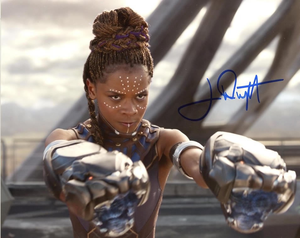 Letitia Wright BLACK PANTHER In Person Signed Photo: Photo size is 8x10. Letitia Wright in person signed autographed photo from the movie BLACK PANTHER. Letita Wright as the character Shuri