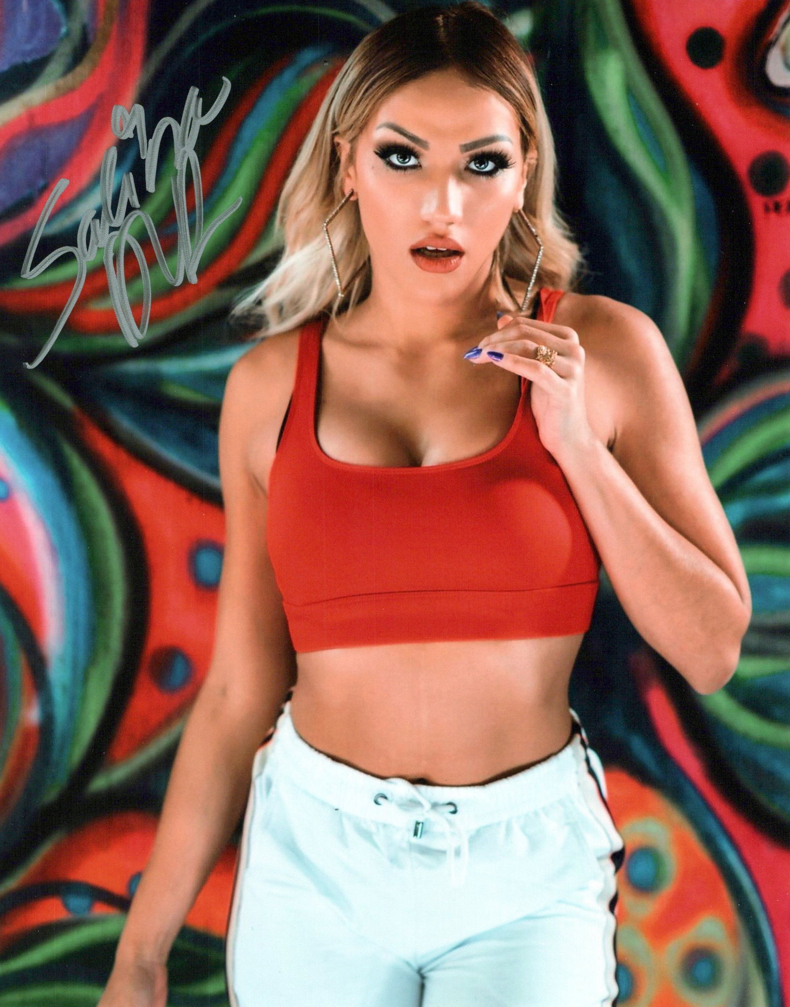 Salina de la Renta WRESTLER In Person Signed Photo: Photo size is 8x10. PRIVATE SIGNING. Salina de la Renta in person signed photo. Natalia Class is a Puerto Rican professional wrestler, valet and actress better known by her ring name Salina de la Rent