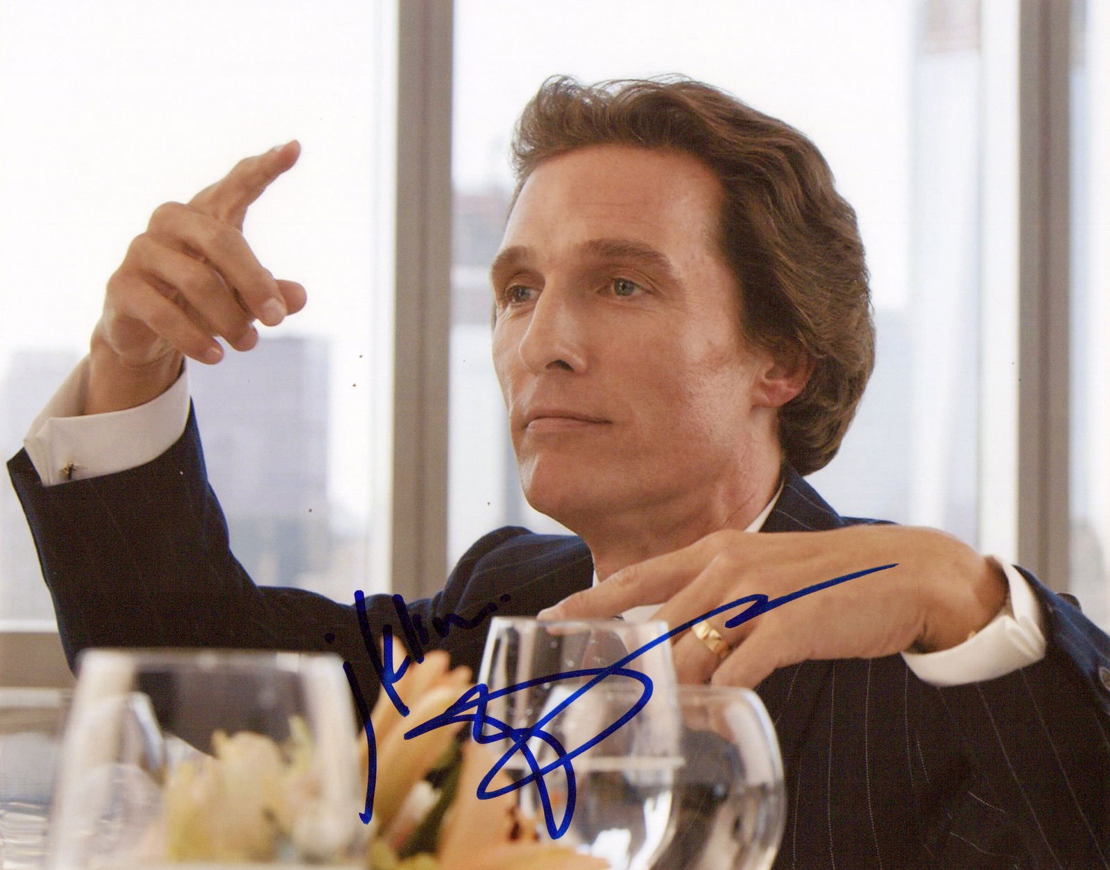 Matthew McConaughey WOLF WALL STREET In Person Signed Photo: Photo size is 8x10. Matthew McConaughey in person signed photo from the movie THE WOLF OF WALL STREET. Matthew McConaughey as the character Mark Hanna.