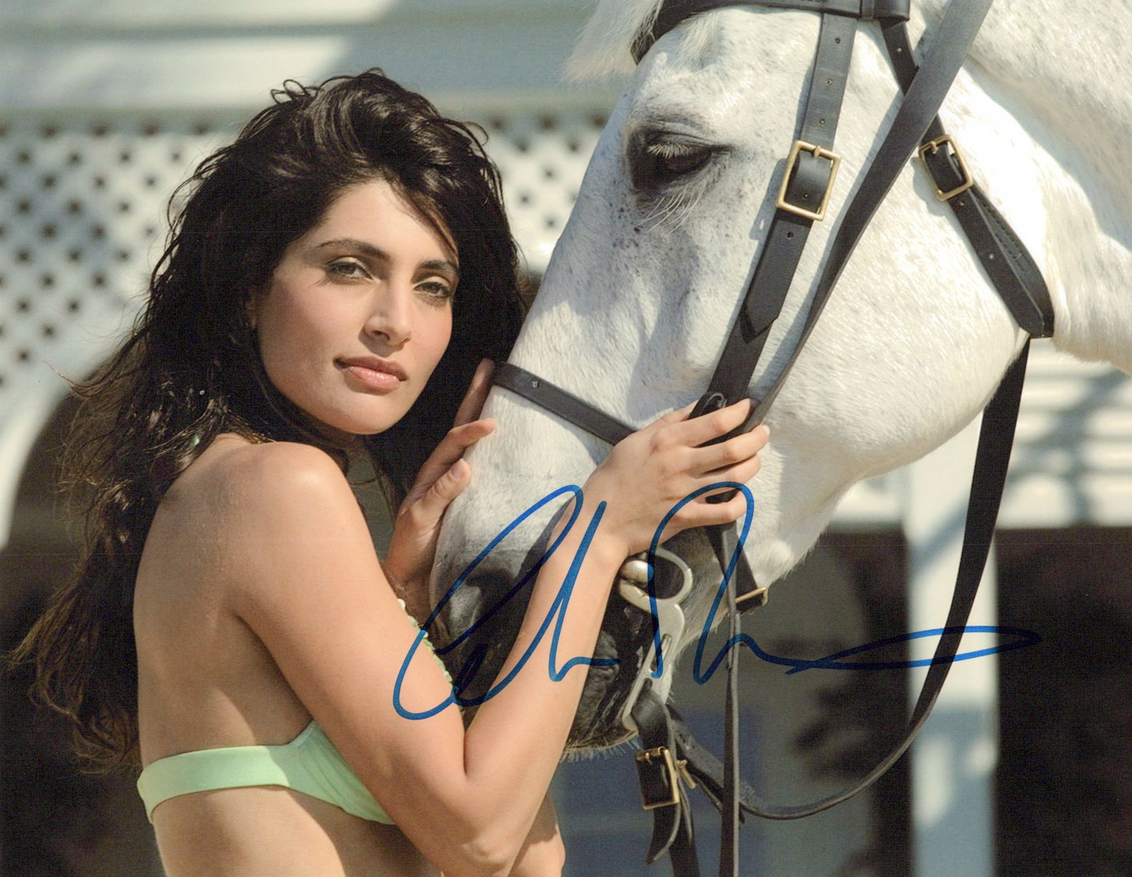 Caterina Murino CASINO ROYALE In Person Signed Photo: Photo size is 8x10. Caterina Murino in person signed photo from the James Bond movie CASINO ROYALE. Caterina Murino as the character Solange