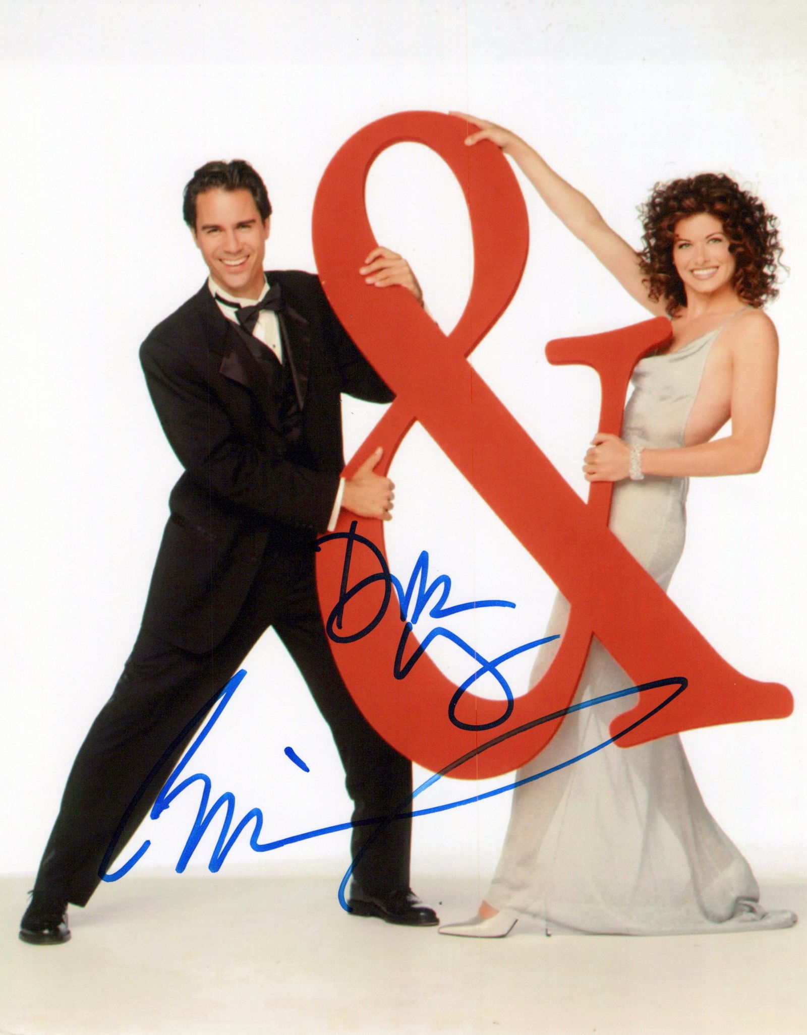 Eric McCormack / Debra Messing WILL & GRACE In Person Signed Photo: Photo size is 8x10. Eric McCormack / Debra Messing in person signed photo from the TV series WILL AND GRACE. Eric MacCormack as the character Will Truman. Debra Messing as the character Grace Adler.