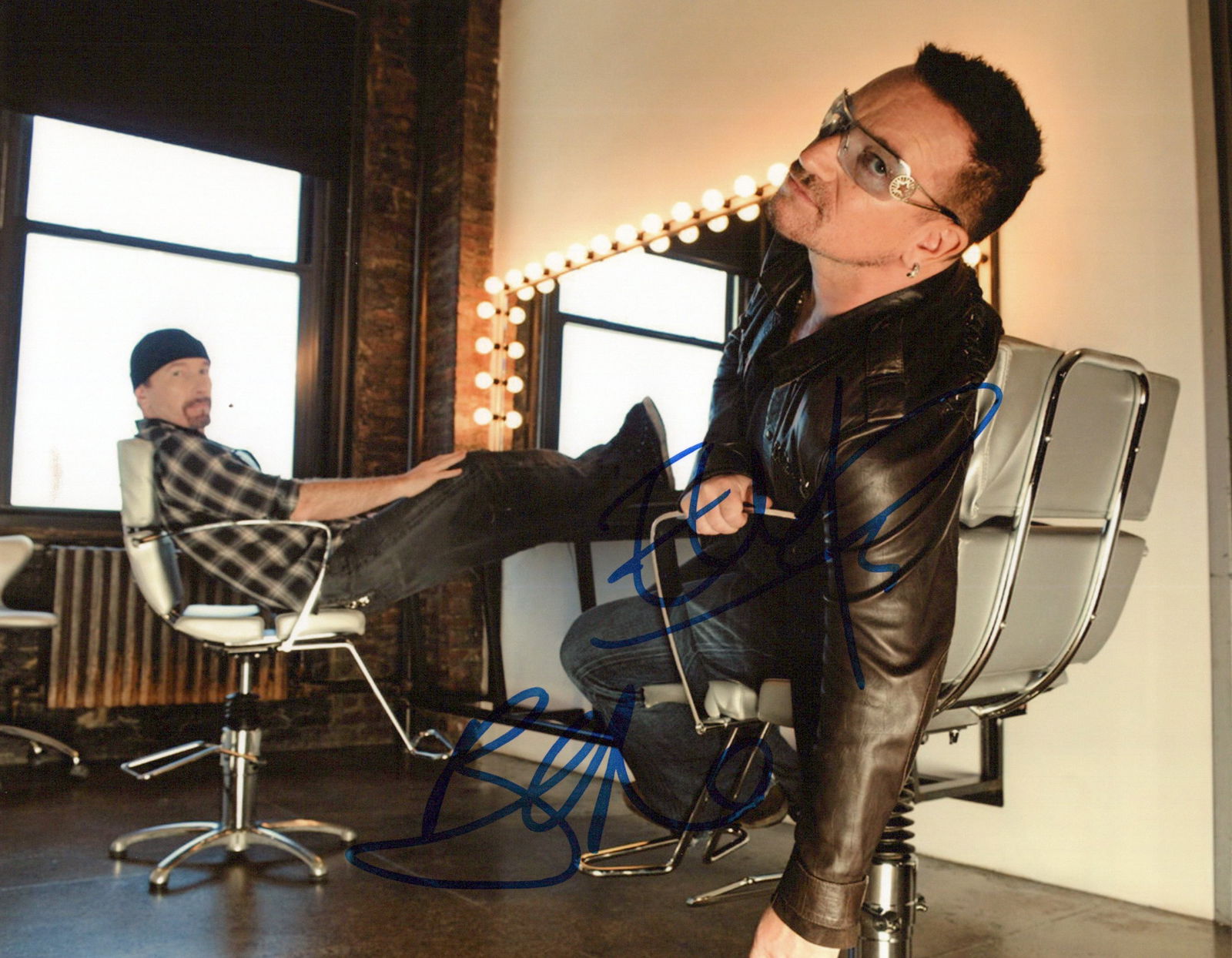 Bono / The Edge U2 In Person Signed Photo: Photo size is 8x10. Bono / The Edge in person signed photo from the band U2. U2 is an Irish rock band formed in Dublin in 1976. The group is composed of Bono (lead vocals), the Edge (lead guitar, keyb