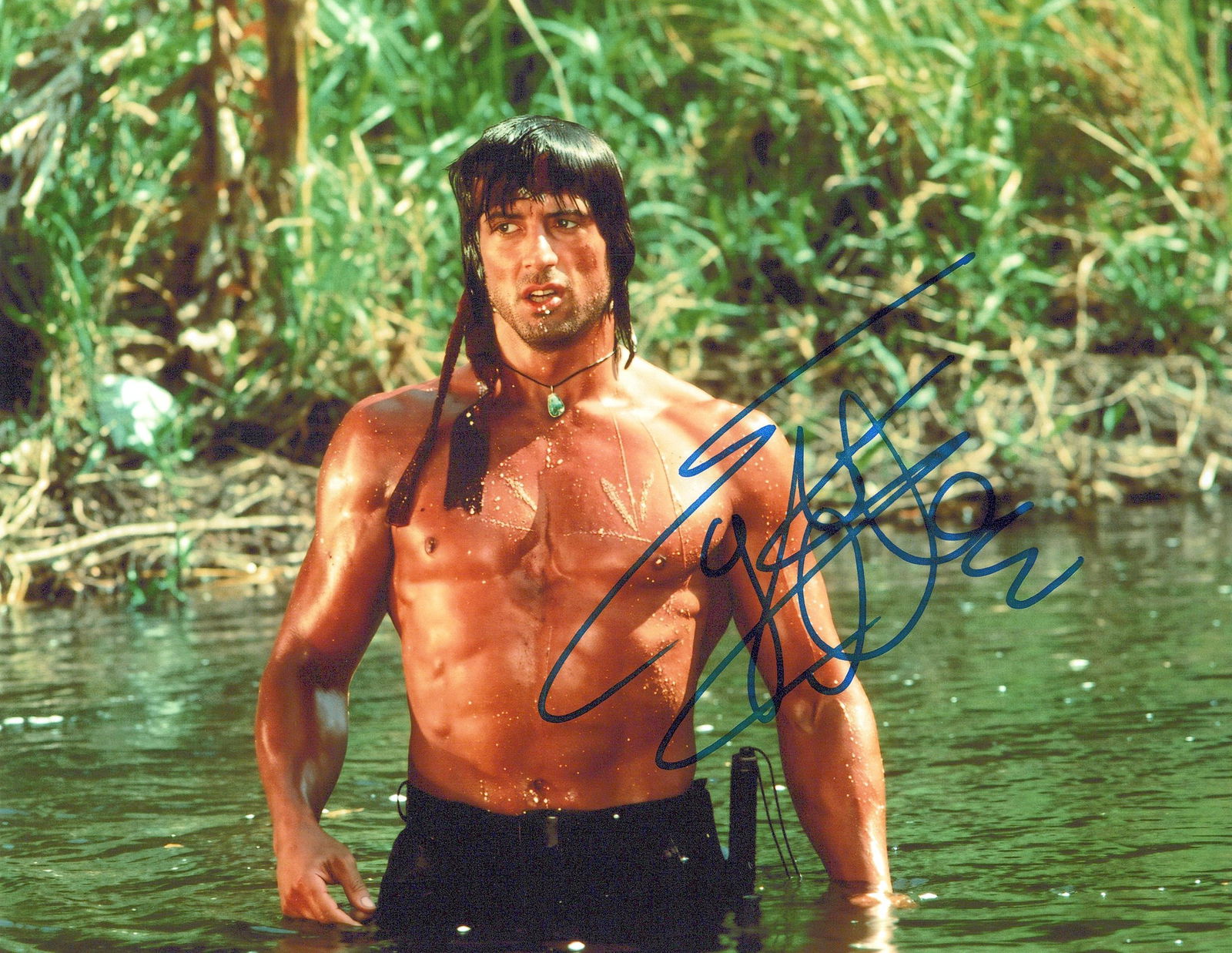 Sylvester Stallone RAMBO In Person Signed Photo: Photo size is 8x10. Sylvester Stallone in person signed autographed photo from the movie RAMBO. Sylvester Stallone as the character Rambo.