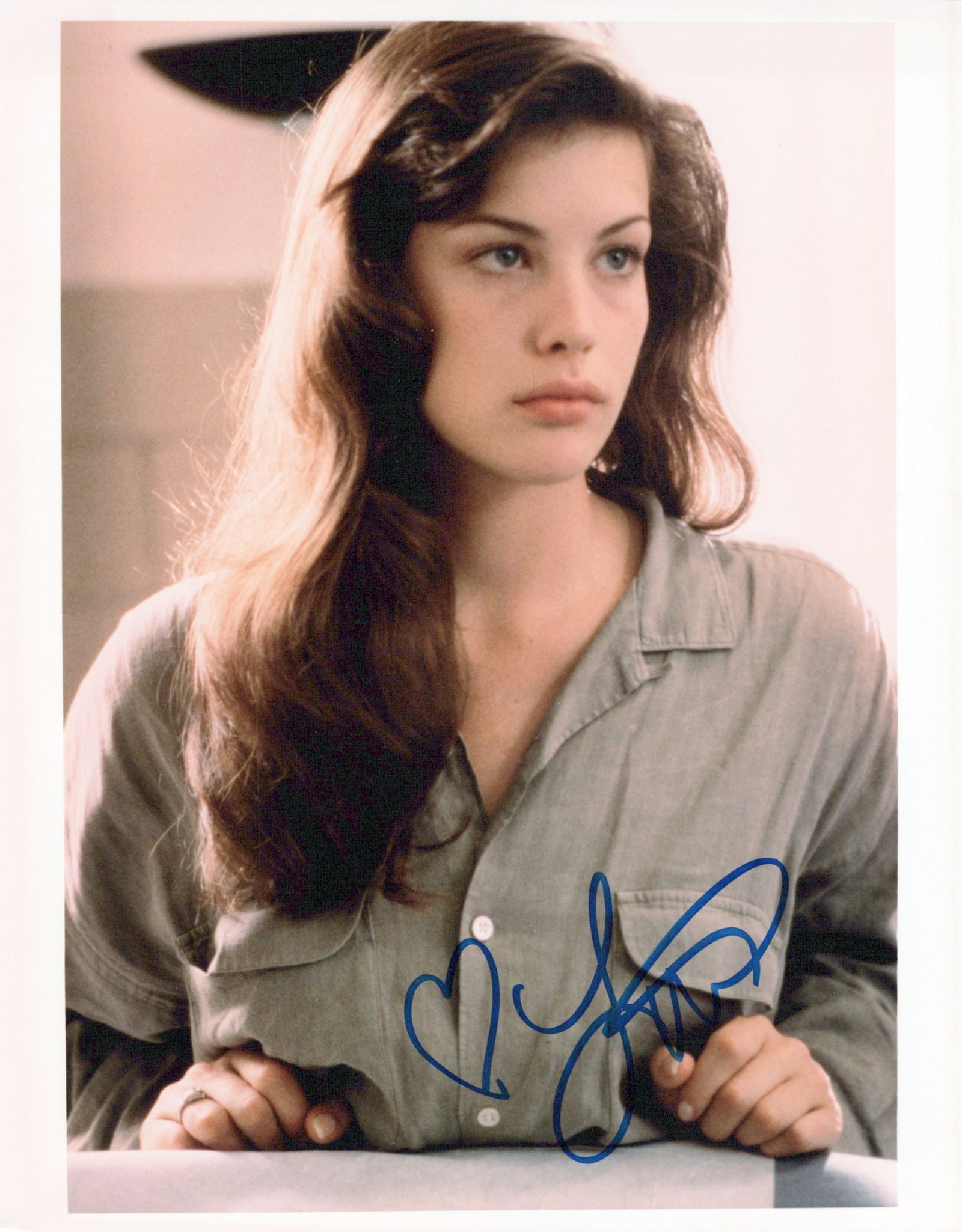Liv Tyler SILENT FALL In Person Signed Photo: Photo size is 8x10. Liv Tyler in person signed photo from the movie SILENT FALL. Liv Tyler as the character Sylvie Warden