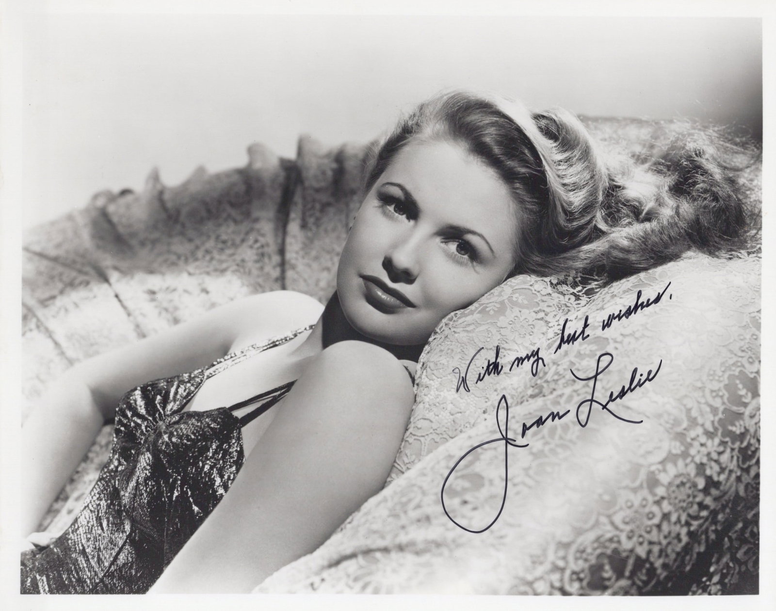 Joan Leslie (1925-2015) YANKEE DOODLE DANDY / SGT. YORK In Person Signed Photo: Photo size is 8x10. Joan Leslie (1925-2015) in person signed photo. Joan Leslie has done such movies as YANKEE DOODLE DANDY, SGT. YORK, and SKY'S THE LIMIT