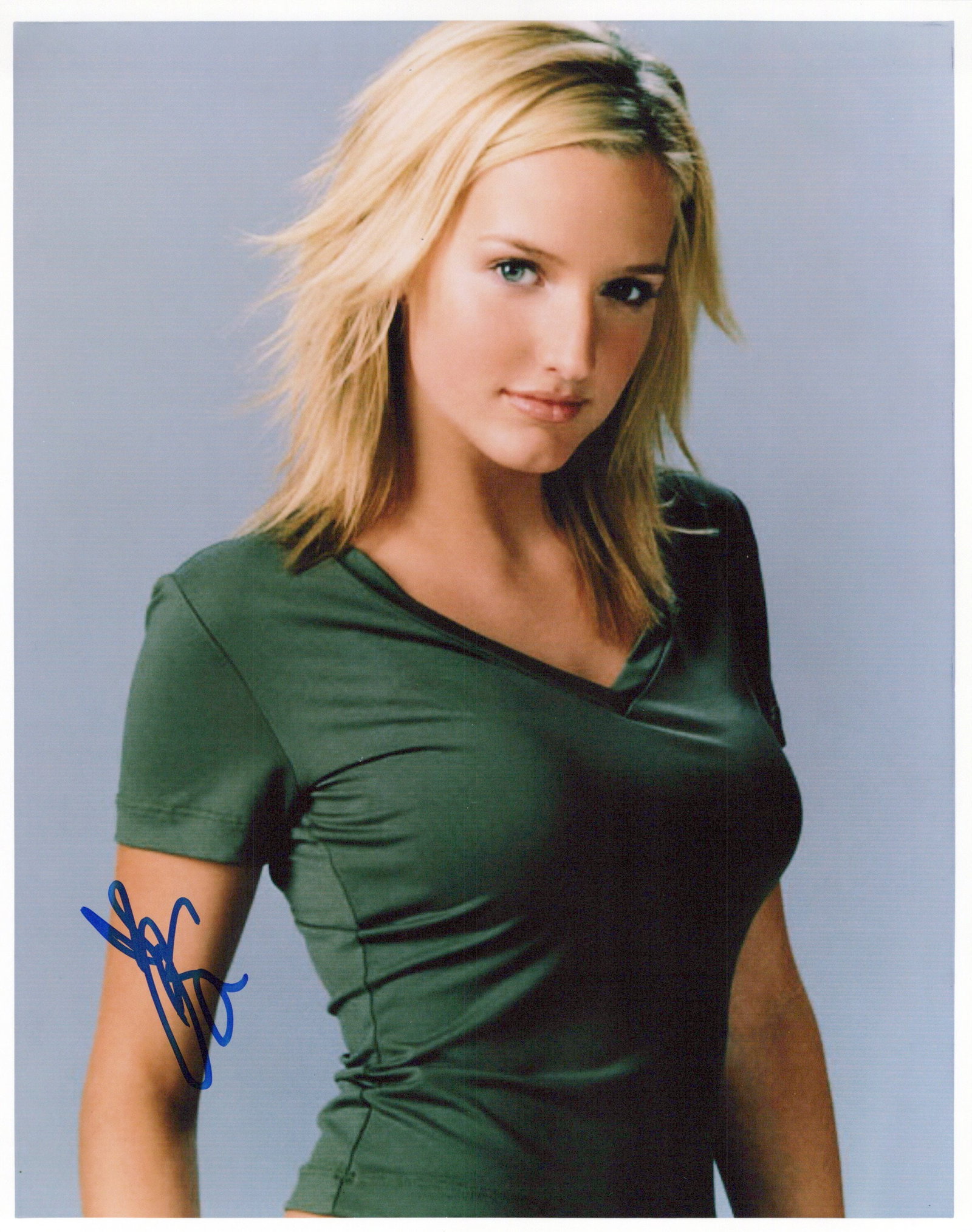 Ashley Simpson SINGER In Person Signed Photo: Photo size is 8x10. Ashley Simpson in person signed photo. Ashley Simpson is an American singer, actress, songwriter, and television personality. Born in Waco, Texas in 1984, she started her career as