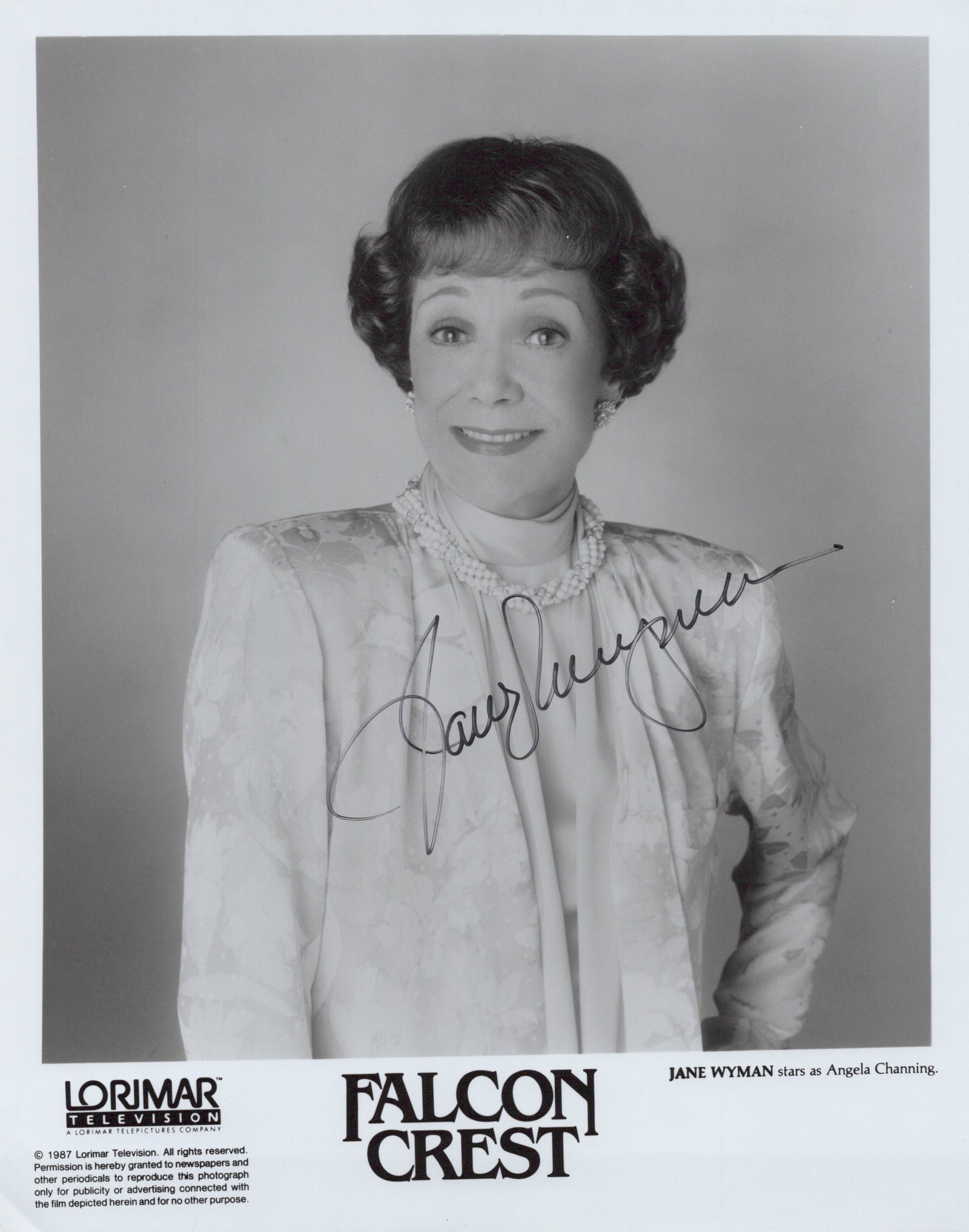 Jane Wyman (1917-2007) FALCON CREST In Person Signed Photo: Photo size is 8x10. Jane Wyman (1917-2007) in person signed photo from the TV series FALCON CREST. Jane Wyman as the character Angela Channing.