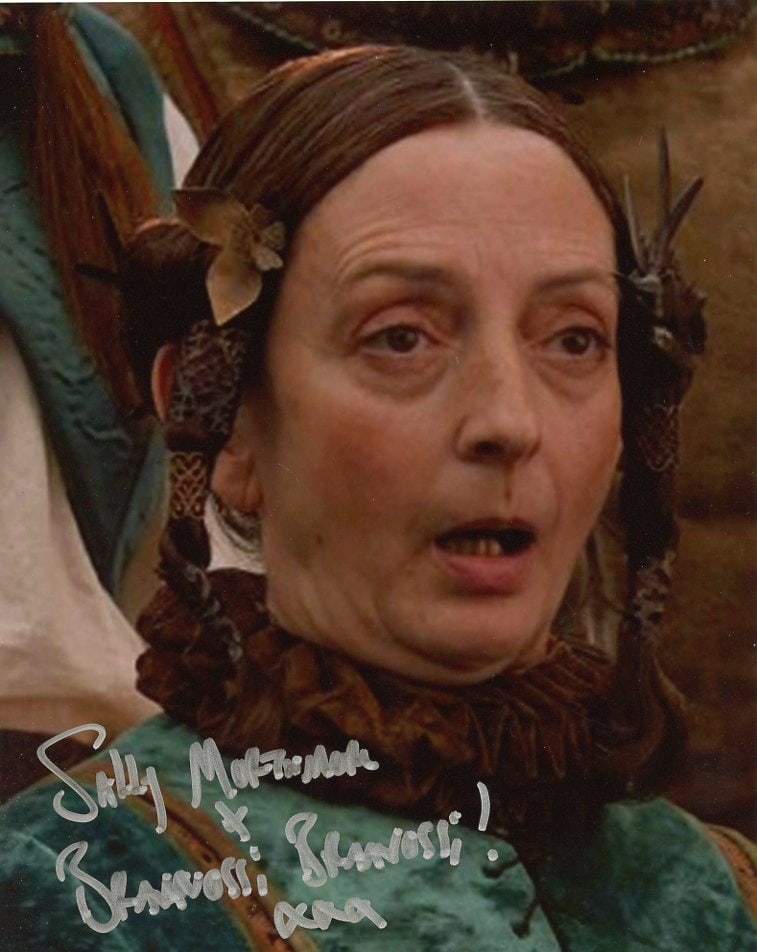 Sally Mortemore GAME OF THRONES In Person Signed Photo: Photo size is 8x10. Sally Mortemore in person signed autographed photo from the HBO series GAME OF THRONES. Sally Mortemore has also added her character name Bravvosi