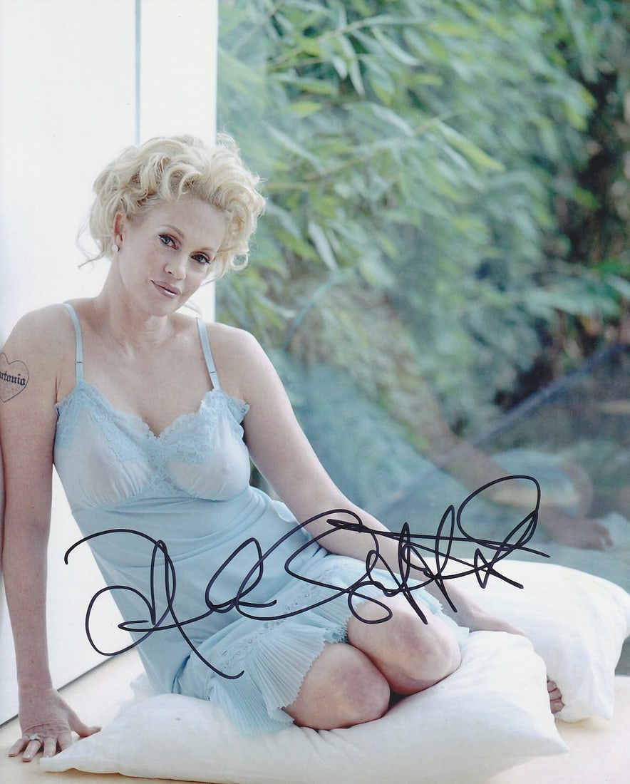 Melanie Griffith WORKING GIRL / SOMETHING WILD In Person Signed Photo: Photo size is 8x10. Melanie Griffith in person signed photo. Melanie Griffith has done such movies as WORKING GIRL, THE BONFIRE OF THE VANITIES, and BODY DOUBLE
