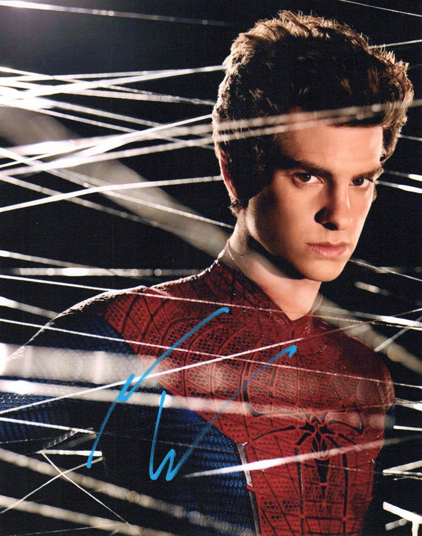 Andrew Garfield AMAZING SPIDER-MAN In Person Signed Photo: Photo size is 8x10. Andrew Garfield in person signed photo from the movie THE AMAZING SPIDER-MAN. Andrew Garfield as the character Peter Parker / Spider-Man.