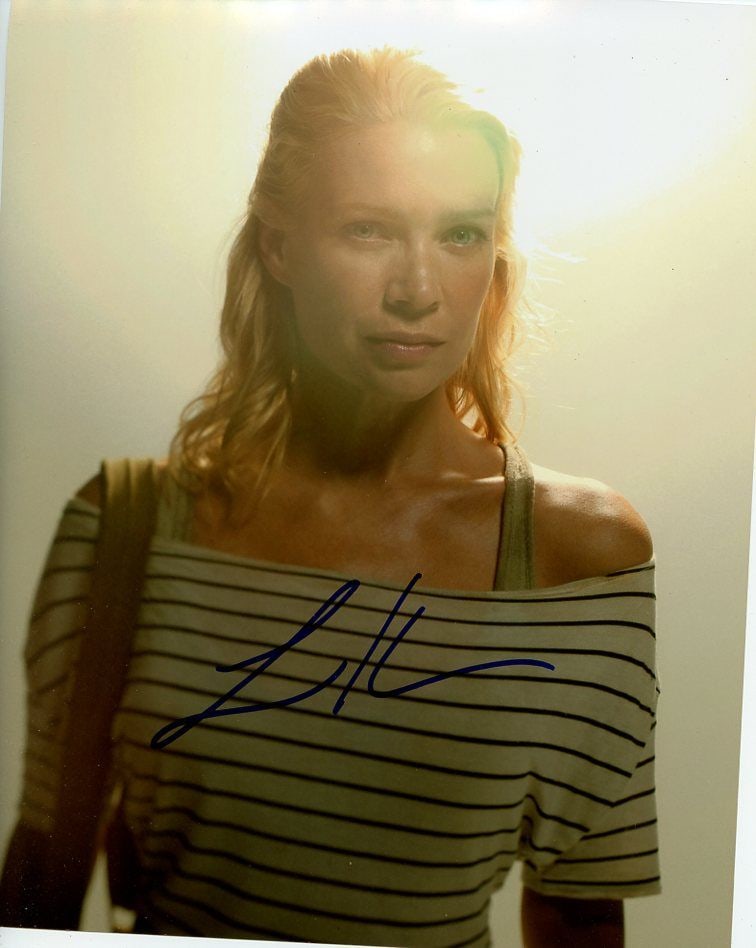 Lori Holden WALKING DEAD In Person Signed Photo: Photo size is 8x10. Laurie Holden in person signed autographed photo from the TV series THE WALKING DEAD. Laurie Holden as the character Andrea Harrison