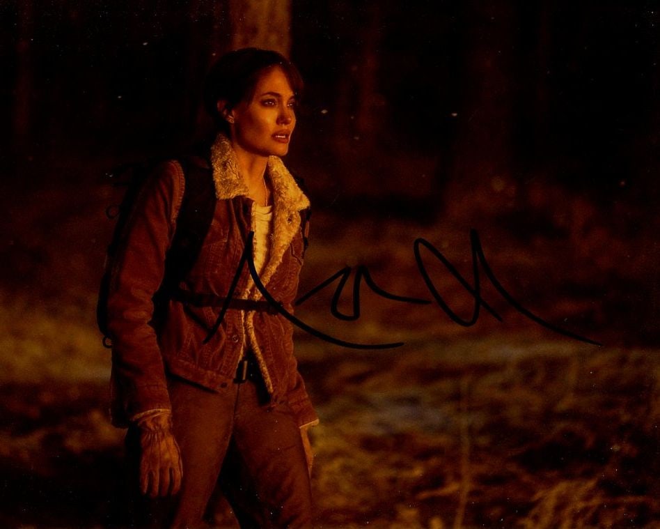 Angelina Jolie WISH ME DEAD In Person Signed Photo: Photo size is 8x10. Angelina Jolie in person signed photo from the movie THOSE WHO WISH ME DEAD. Angelina Jolie as the character Hannah.