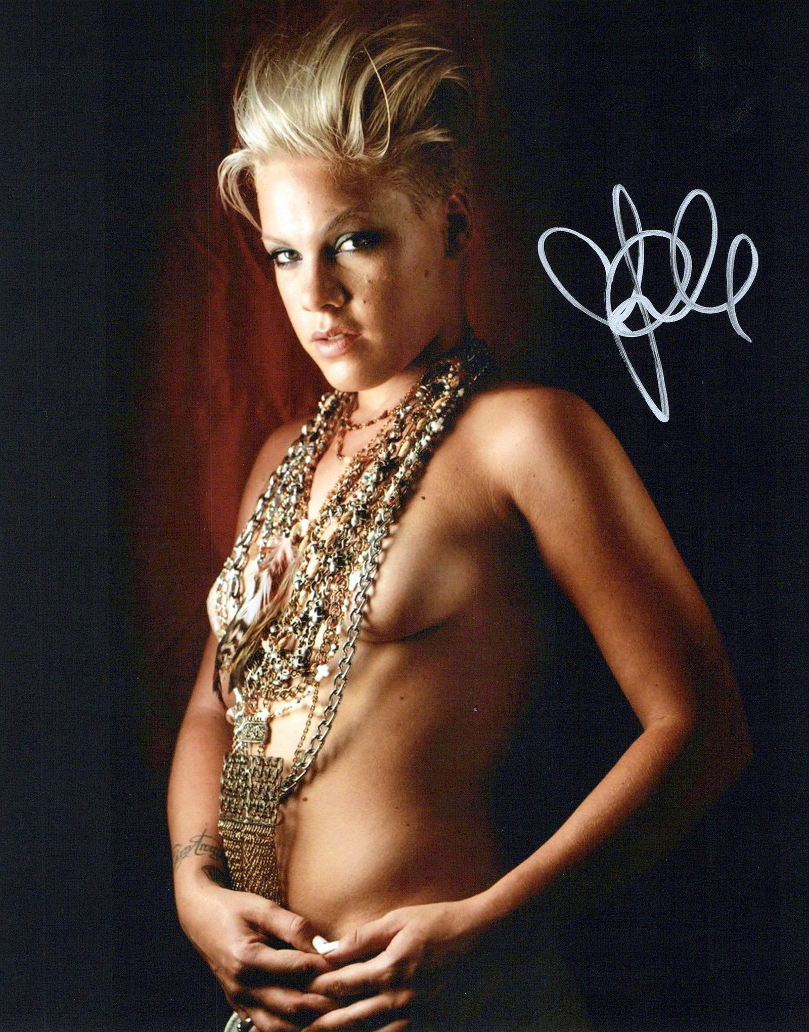Pink MUSICIAN In Person Signed Photo: Photo size is 8x10. Pink in person signed photo. Pink Alecia Beth Moore Hart, known professionally as Pink, is an American singer, songwriter, actress and dancer. She was a member of the girl group Ch
