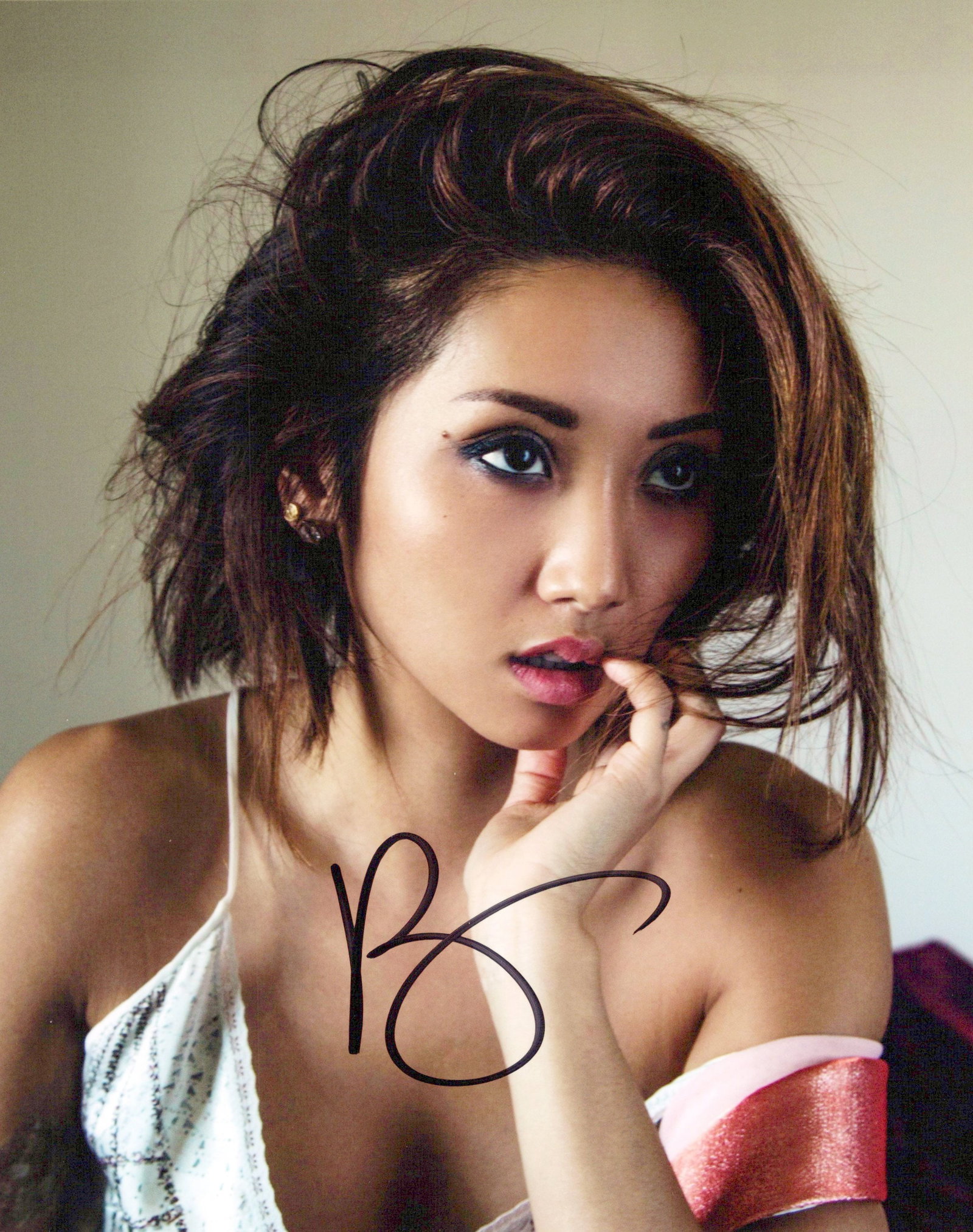Brenda Song SEXY / STUNNING In Person Signed Photo: Photo size is 8x10. Brenda Song in person signe dphoto. Brenda Song has done such TV and movies as THE SOCIAL NETWORK, SUITE LIVE OF ZACK AND CODY, and RUNNING POINT.