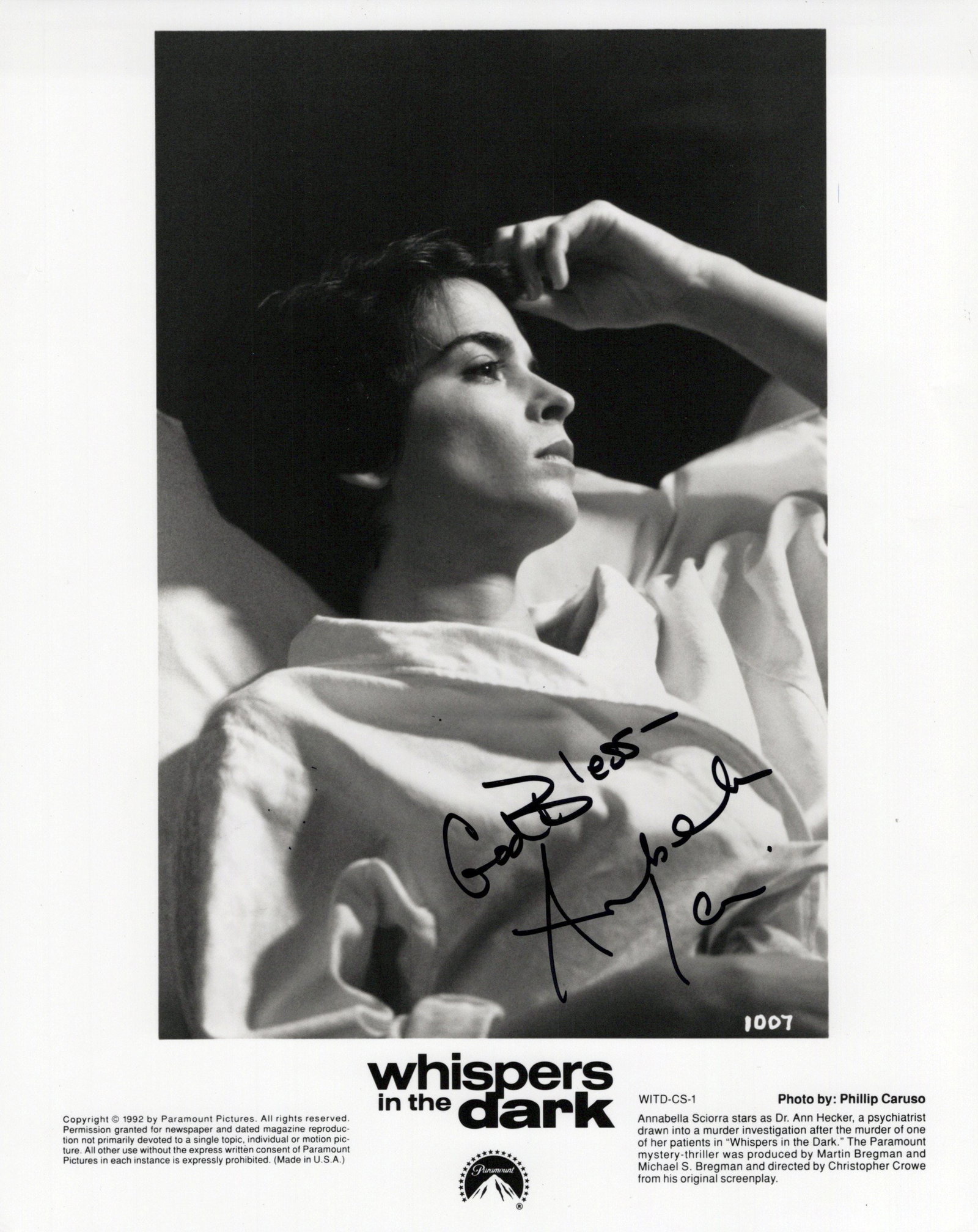 Annabella Sciorra WHISPERS IN THE DARK Signed Photo: Photo size is 8x10. Annabella Sciorra signed photo from the movie WHISPERS IN THE DARK. Annabella Sciorra as the character Ann Hecker