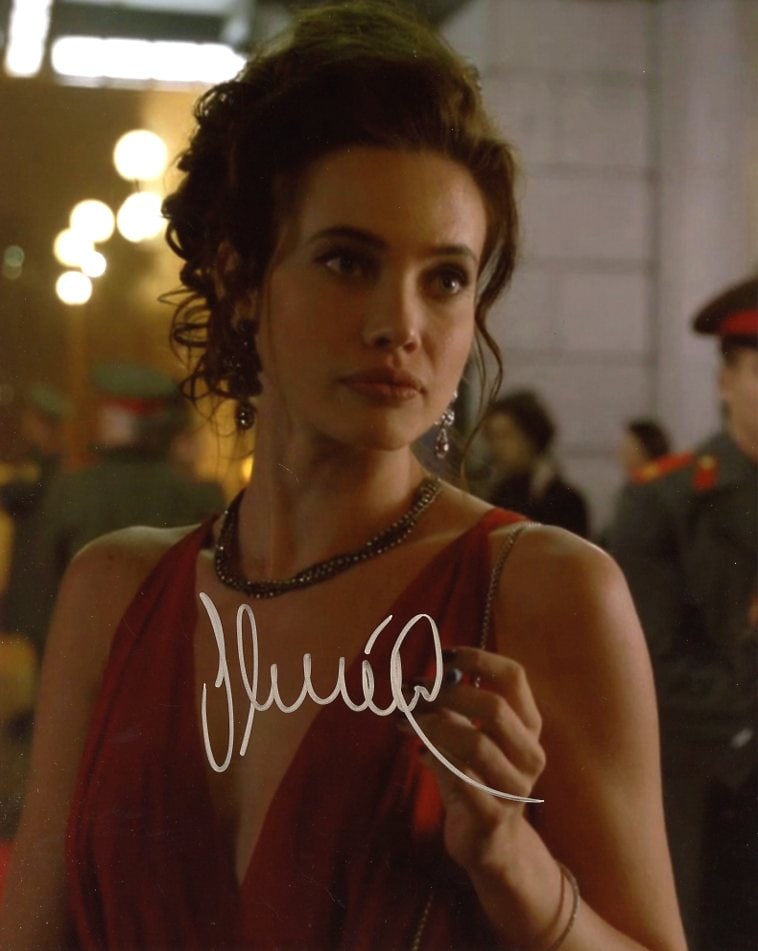 Stephanie Corneliussen LEGENDS OF TOMORROW Signed Photo: Photo size is 8x10. Stephanie Corneliussen in person signed autographed photo from the TV series LEGENDS OF TOMORROW. Stephanie Corneliussen as the character Dr. Valentina Vostok / Soviet Firestorm.