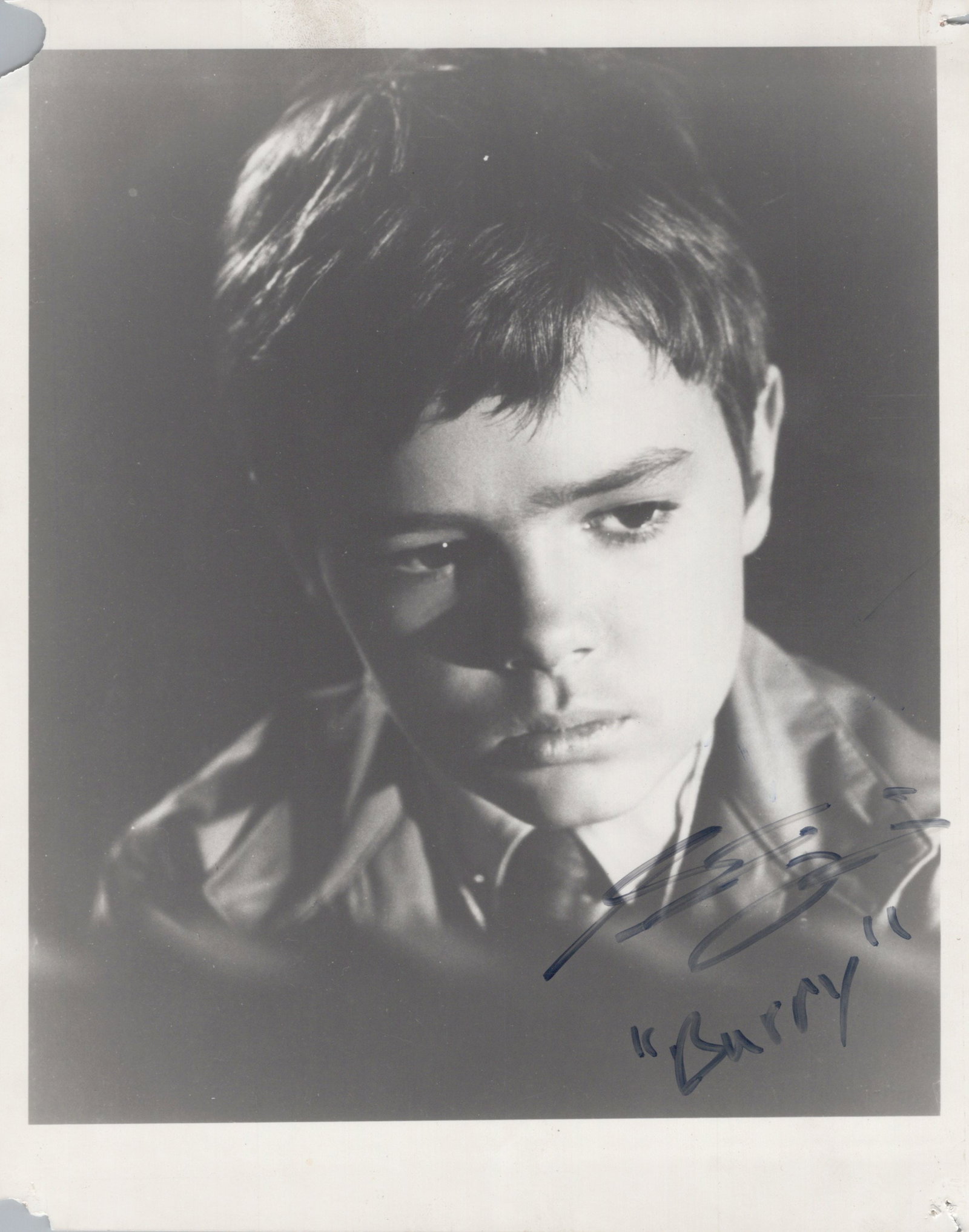 Stefan Arngrim LAND OF THE GIANTS In Person Signed Photo: Photo size is 8x10. PLEASE SEE IMAGE CAREFULLY. Pin holes in all four corners. Tears in the upper right and lower right of photo. Stefan Arngrim in person signed photo from the TV series LAND OF THE G