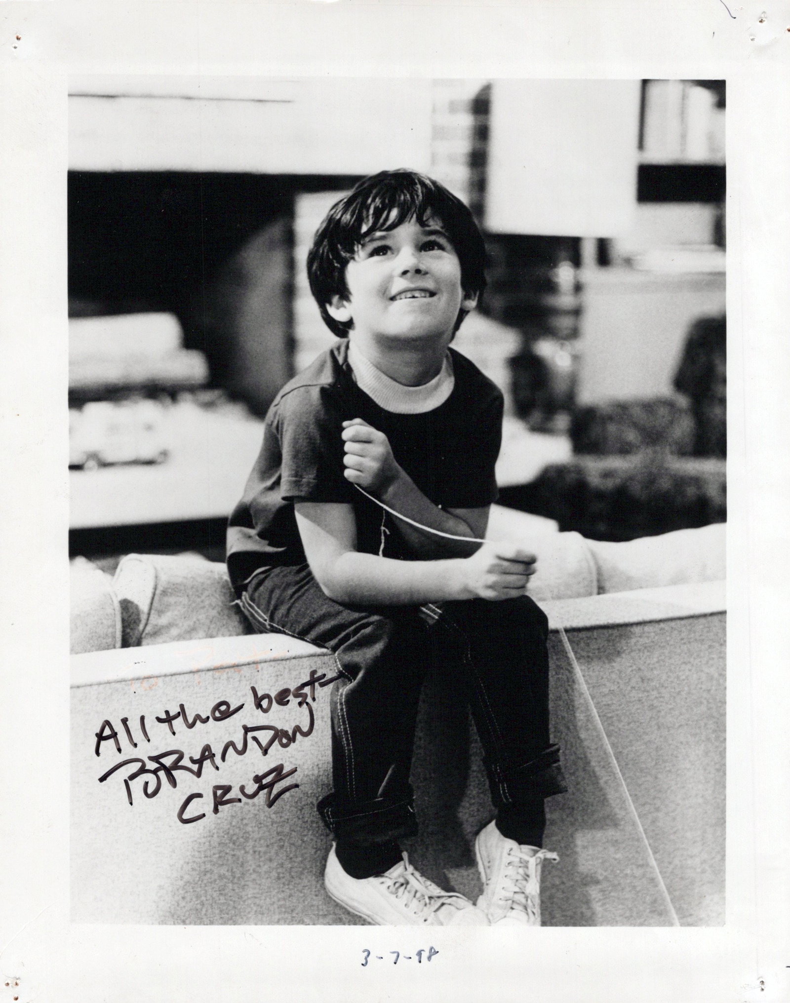 Brandon Cruz COURTSHIP EDDIE'S FATHER In Person Signed Photo: Photo size is 8x10. Photo size is 8x10. PLEASE SEE IMAGE CAREFULLY. Pin holes in all four corners. Alo dated 3-7-98. Brandon Cruz in person signed photo from the TV series THE COURTSHIP OF EDDIE'S FAT