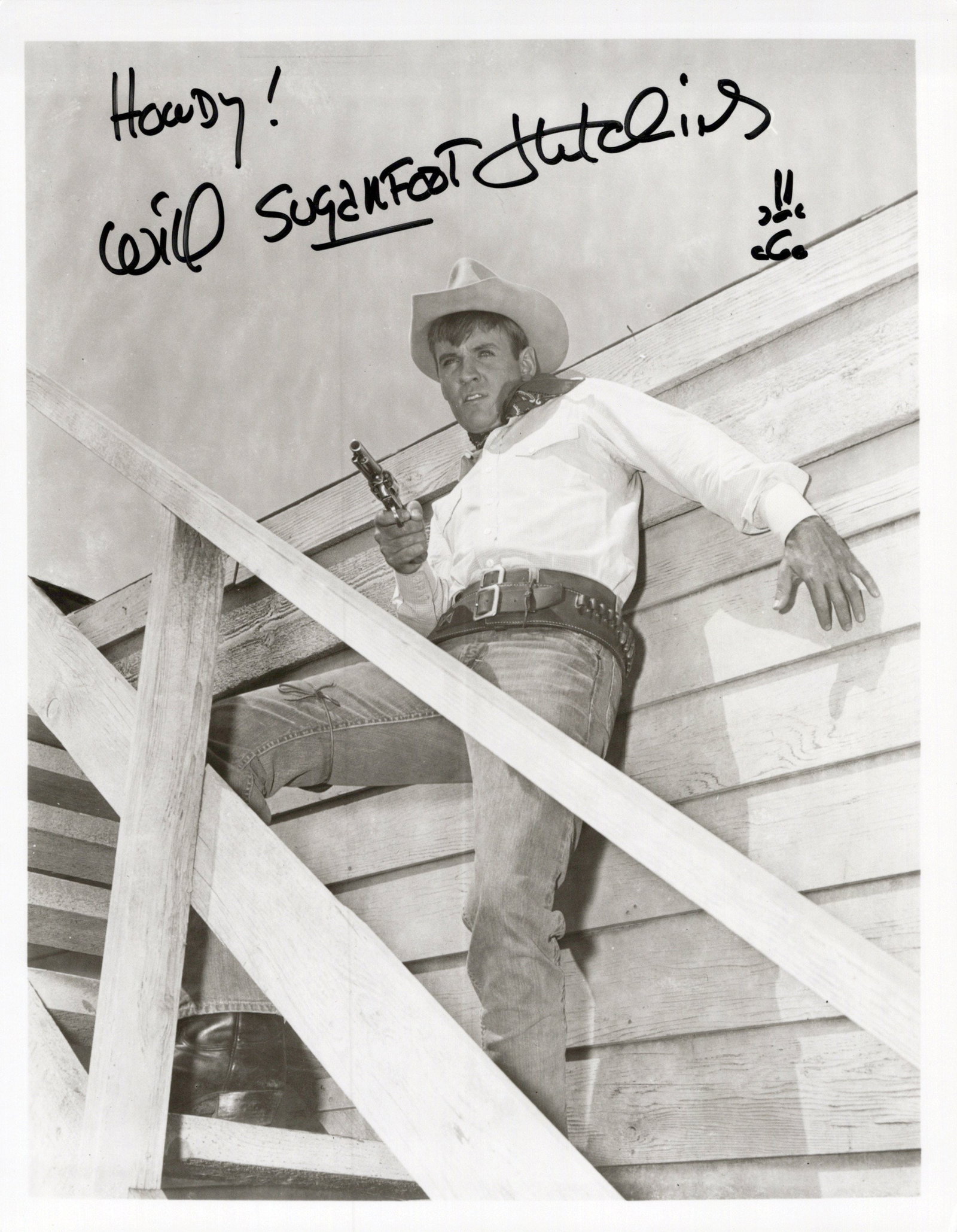 Will Hutchins (1930-2025) SUGAR FOOT In Person Signed Photo: Photo size is 8x10. Will Hutchins (1930-2025) in person signed photo from the TV series SUGARFOOT. will Hutchins as the character Sugarfoot