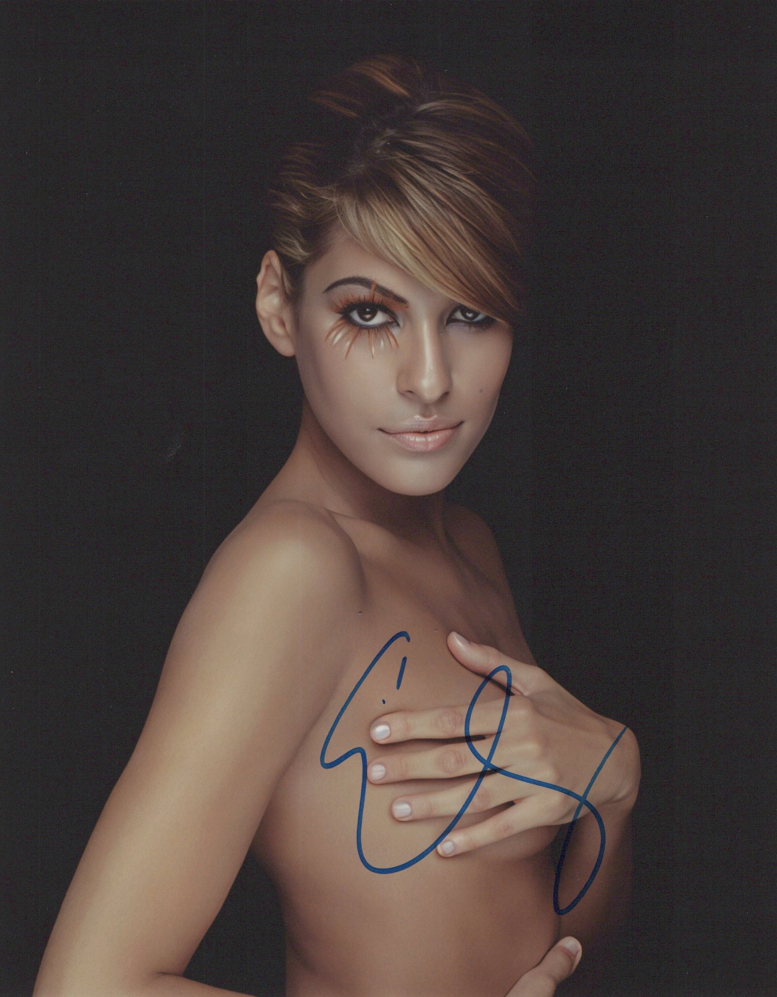 Eva Mendes SEXY In Person Signed Photo: Photo size is 8x10. Eva Mendes in person signed photo. Eva Mendes has done such movies as HITCH, ONCE UPON A TIME IN MEXICO, and FAST FIVE.