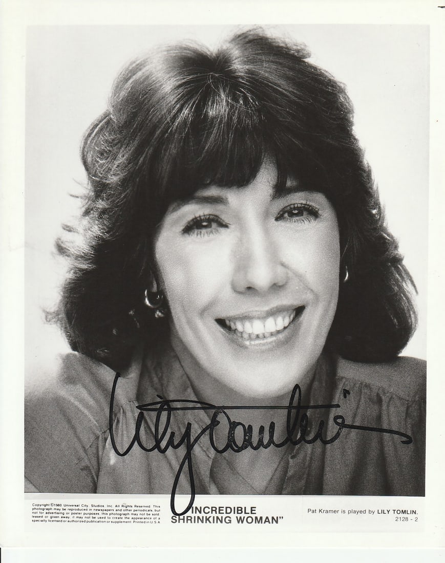 Lily Tomlin SHRINKING WOMAN In Person Signed Photo: Photo size is 8x10. Lily Tomlin in person signed photo from the movie THE INCREDIBLE SHRINKING WOMAN. Lily Tomlin as the character Pat Kramer