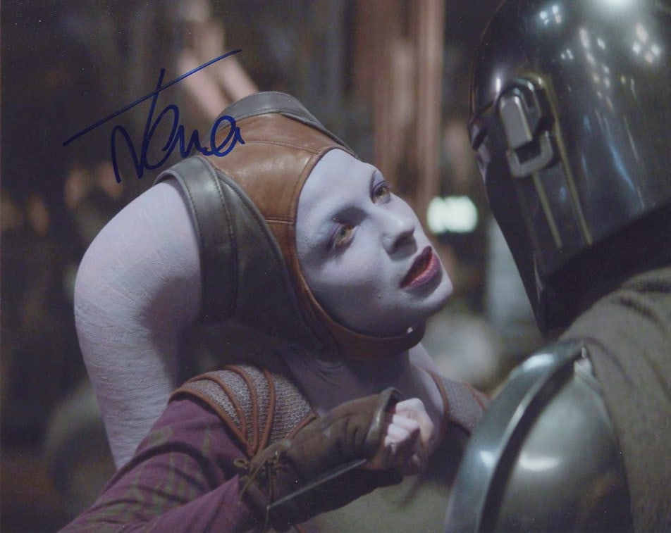 Natalia Tena MANDALORIAN In Person Signed Photo: Photo size is 8x10. Natalia Tena in person signed autographed photo from the TV series THE MANADALORIAN. Natalia Tena as the character Xi'an.