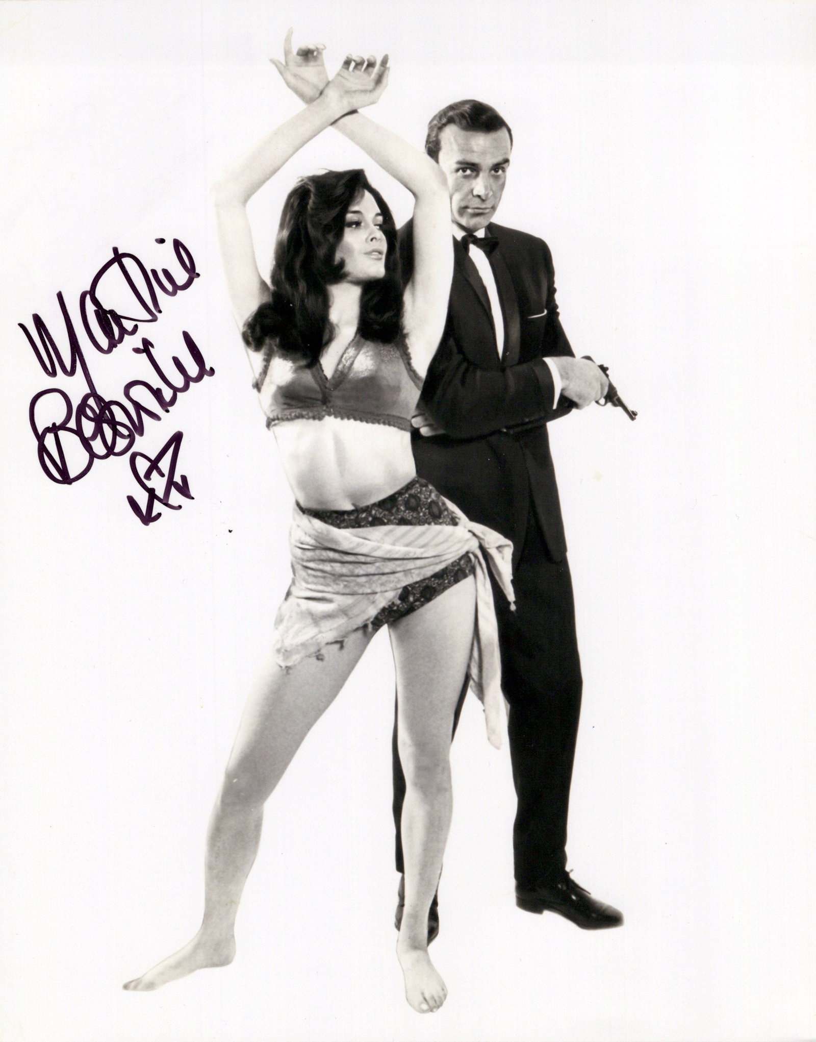 Martine Beswick FROM RUSSIA WITH LOVE - James Bond - In Person Signed Photo: Photo size is 8x10. PRIVATE SIGNING. Martine Beswick in person signed photo from the James Bond movie FROM RUSSIA WITH LOVE. Martine Beswick as the character Zora.