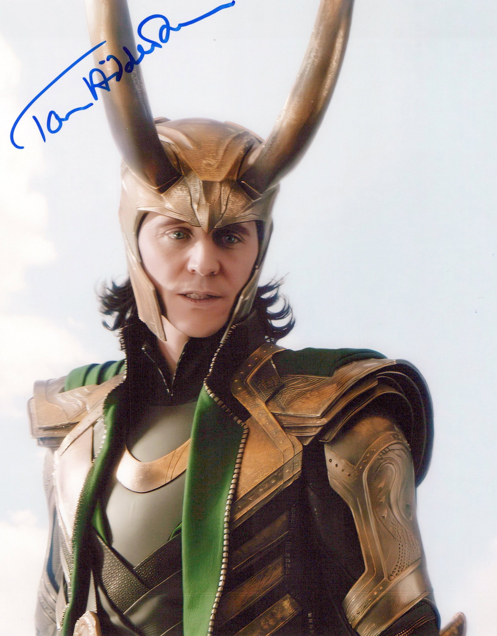 Tom Hiddleston THOR RAGNAROK In Person Signed Photo: Photo size is 8x10. Tom Hiddleston in person signed autographed photo from the movie THOR RAGNAROK. Tom Hiddleston as the character Loki