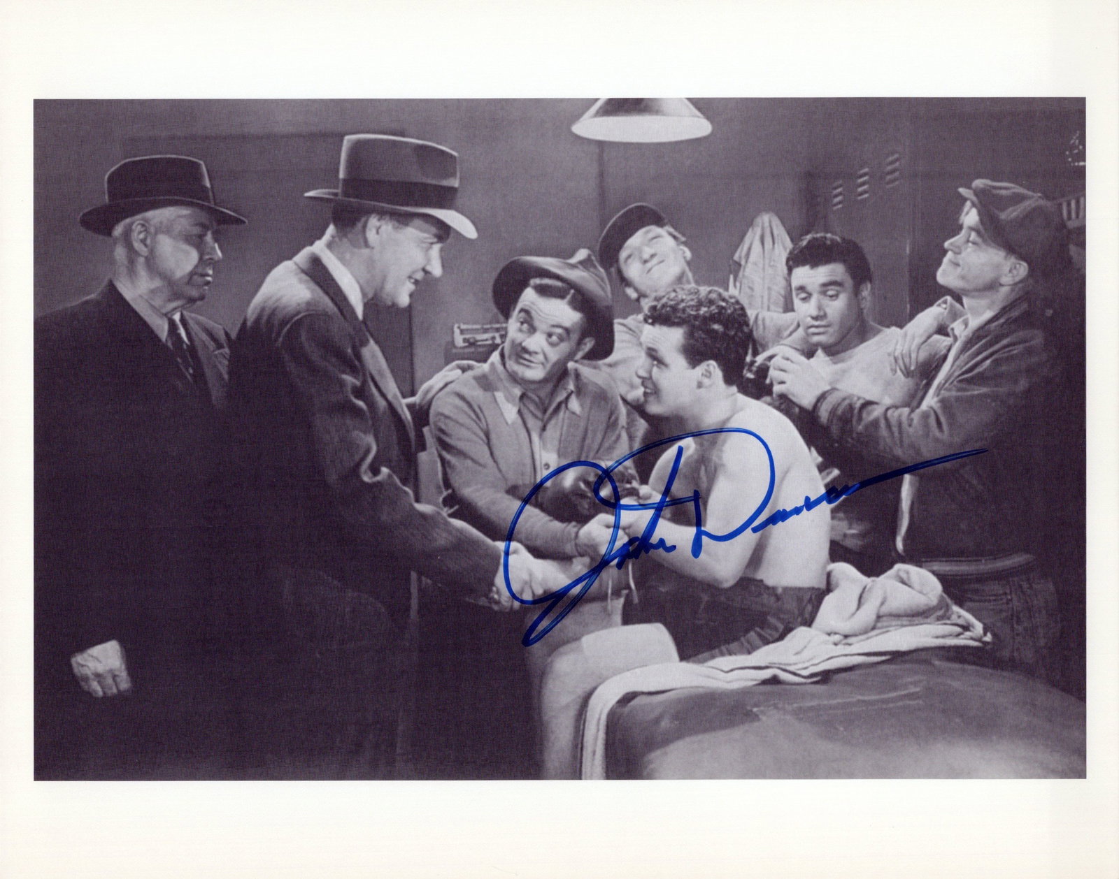 Johnny Duncan (1923-2016) MILLION-DOLLAR KID In Person Signed Photo: Photo size is 8x10. Johnny Duncan (1923-2016) in person signed photo from the movie MILLION-DOLLAR KID. Johnny Duncan as the character Roy Cortland