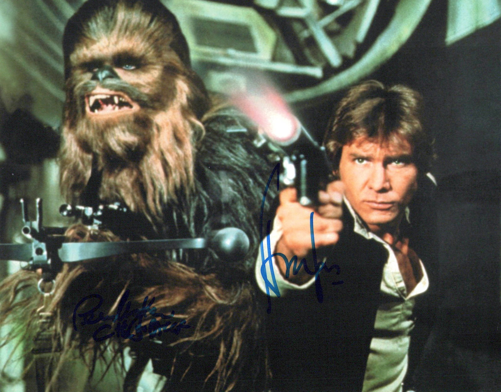 Harrison Ford / Peter Mayhew (1944-2019) STAR WARS In Person Signed Photo: Photo size is 8x10. AMAZING STAR WARS PHOTO!! Harrison Ford / Peter Mayhew (1944-2019) in person signed photo from the movie STAR WARS. Harrison Ford as the character Han Solo. Peter Mayhew as the cha