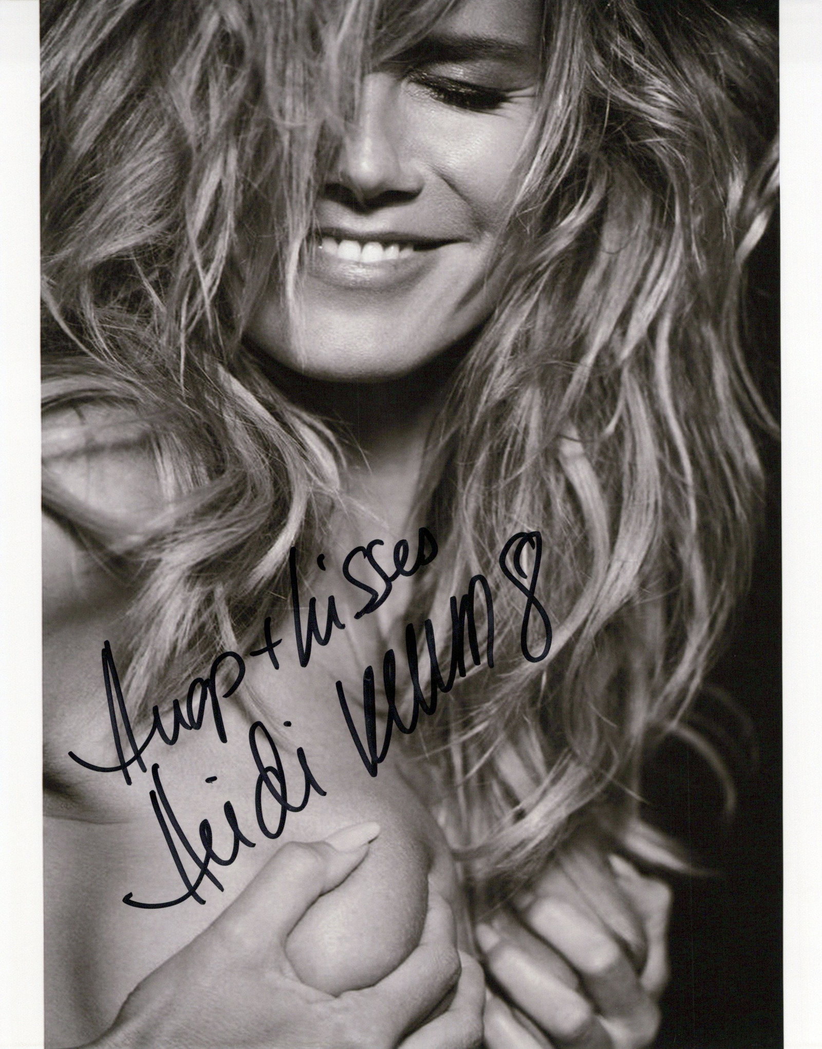 Heidi Klum SUPERMODEL / PROJECT RUNWAY In Person Signed Photo: Photo size is 8x10. Heidi Klum sexy, beautiful in person signed photo. Heidi Klum is a German and American model, television host, producer, and businesswoman. She appeared on the cover of the Sports