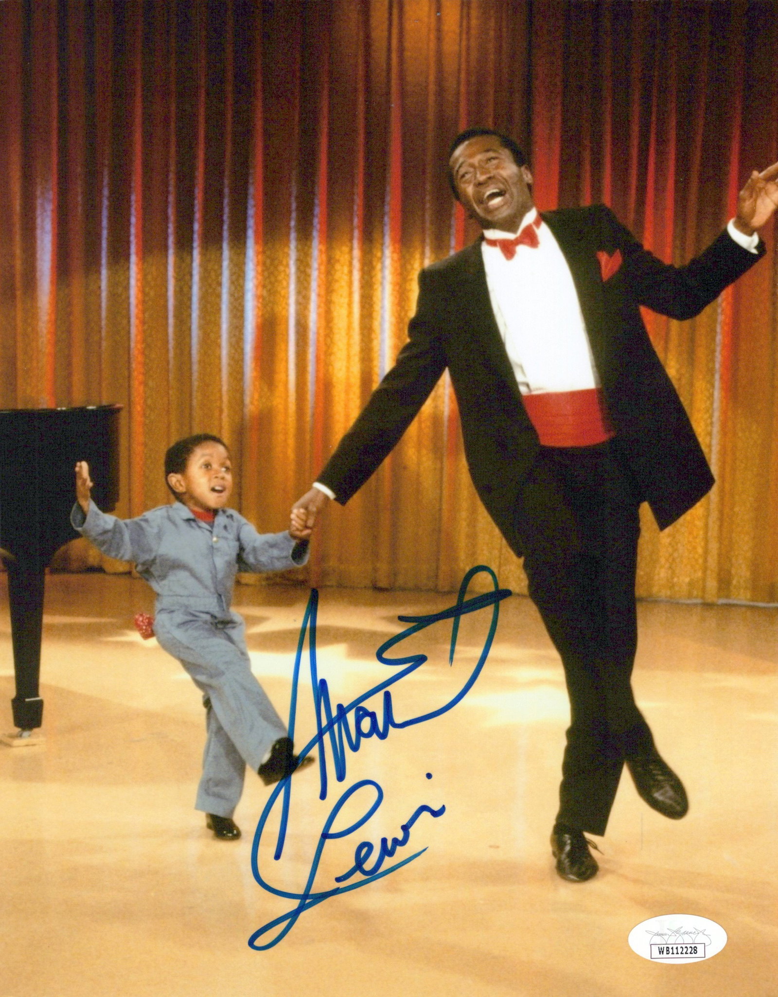 Emmanuelle Lewis WEBSTER In Person Signed Photo: Photo size is 8x10. PRIVATE SIGNING JSA AUTHENTICATED. Emmanuelle Lewis in person signed photo from the TV series WEBSTER. Emmanuelle Lewis as the character Webster.